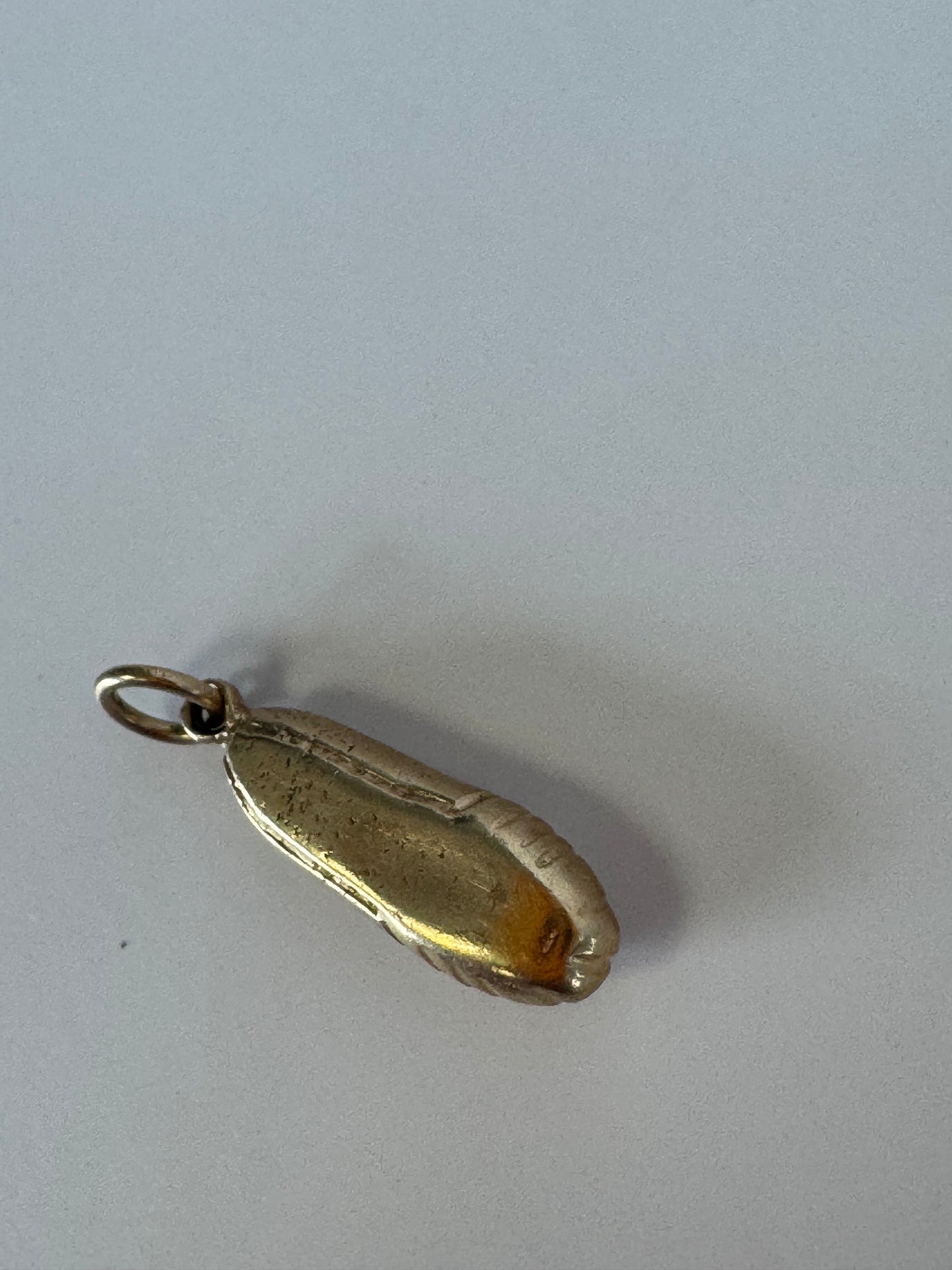 1950s vintage 14K gold ballet slipper charm with textured details, dimensional dance shoe design