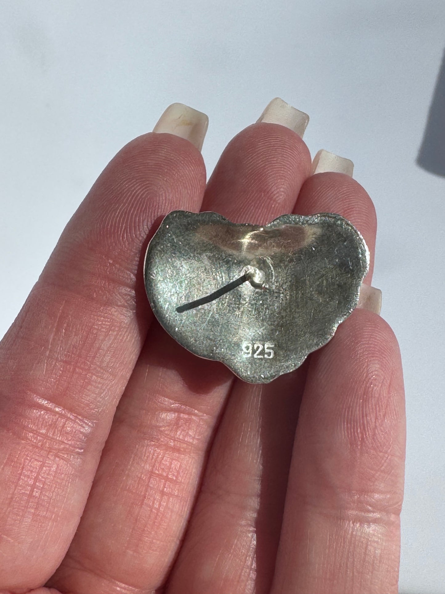 Vintage Mexican sterling silver ribbed puffy heart earrings with dimensional swirl pattern and high polish finish