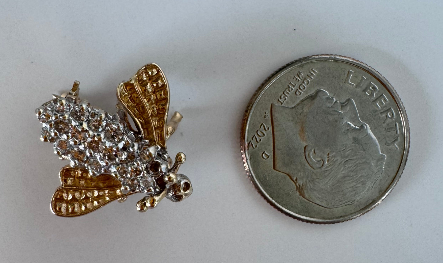 Estate 14K gold bee brooch with diamond-encrusted body and textured wings, vintage insect pin jewelry