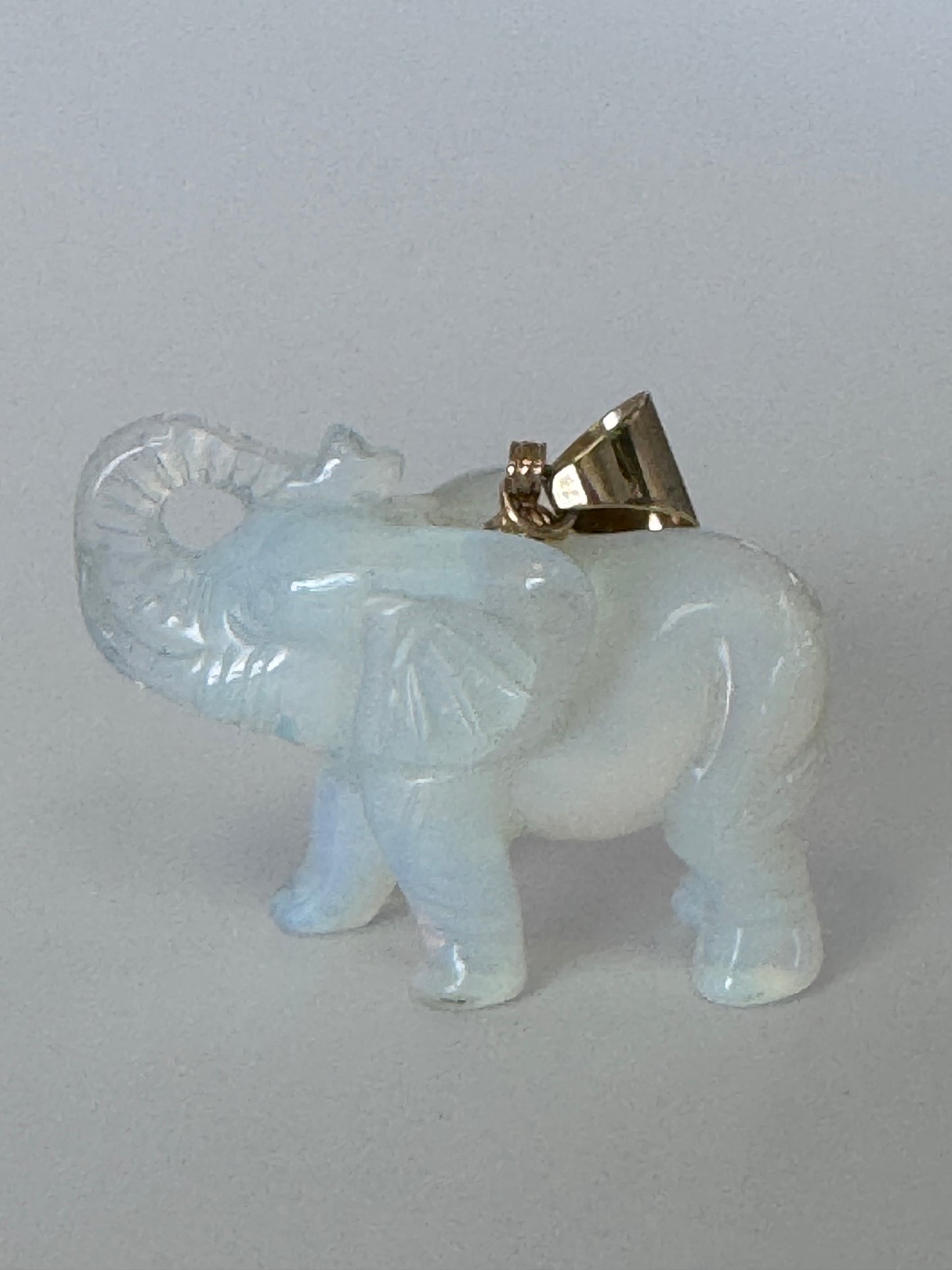 Large hand carved opal elephant pendant with 14K gold bail, trunk up position, estate jewelry good luck charm