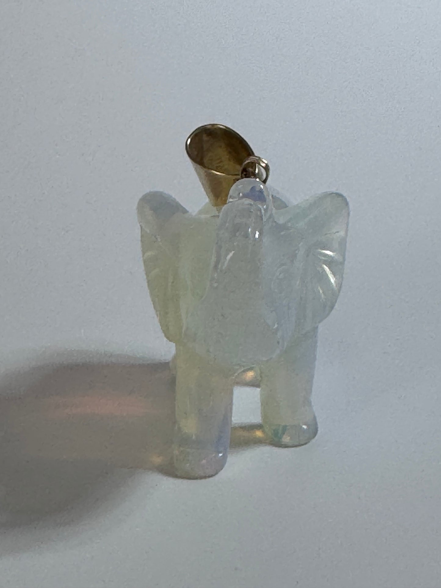 Large hand carved opal elephant pendant with 14K gold bail, trunk up position, estate jewelry good luck charm