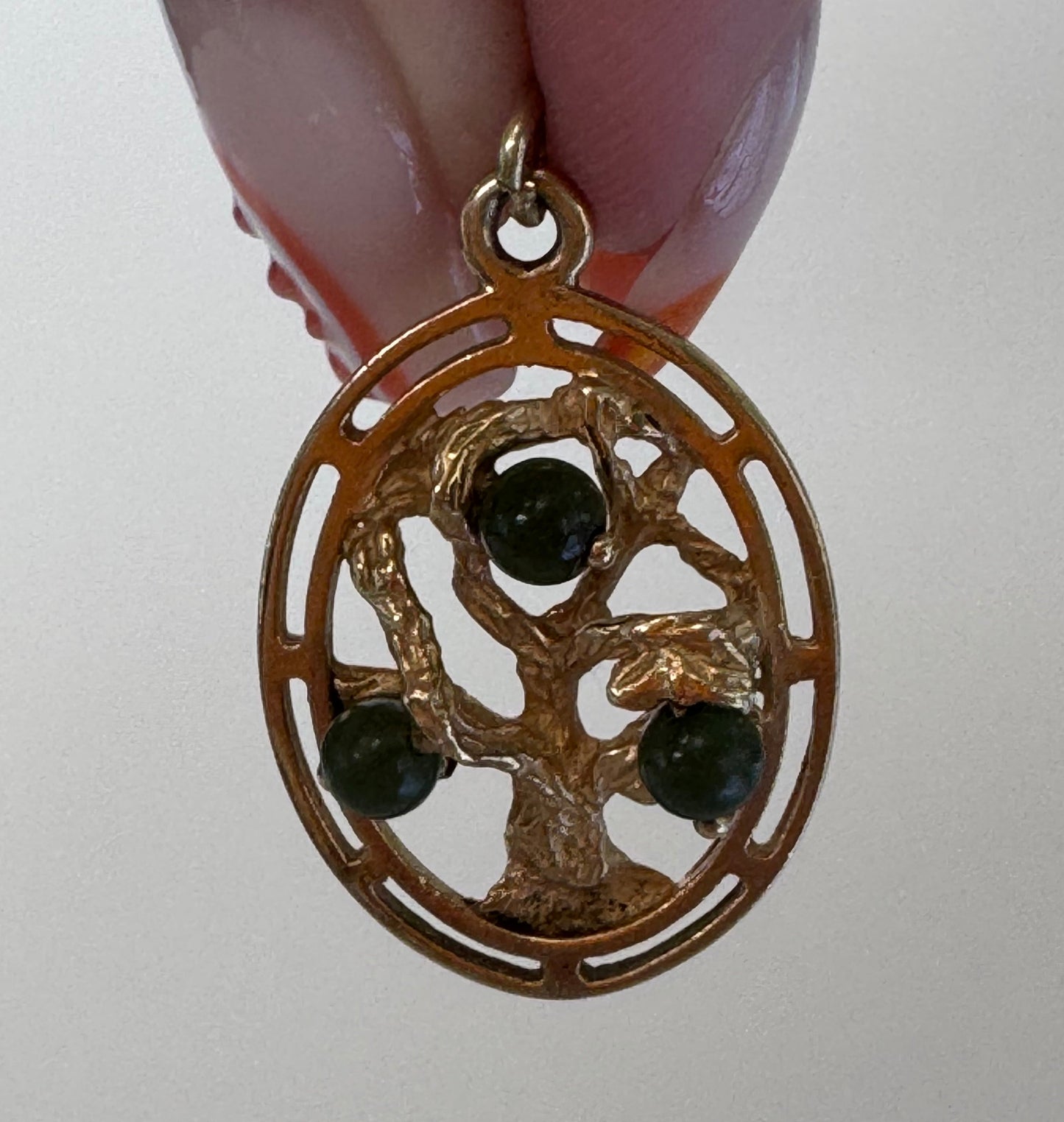Mid century 14K gold Tree of Life charm pendant with jade accents, pierced branch design, vintage spiritual jewelry