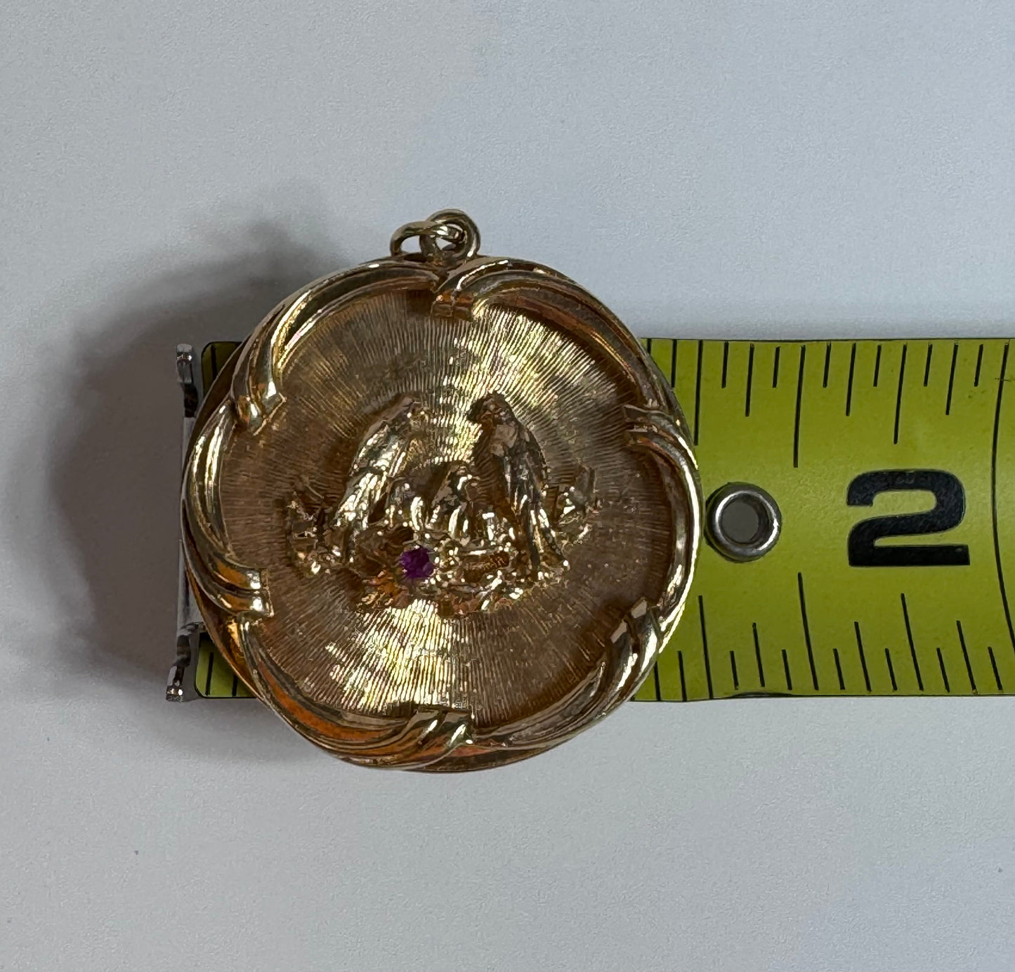 1950s 14K gold love birds medallion pendant with engine turned background and ruby accent, vintage romantic jewelry