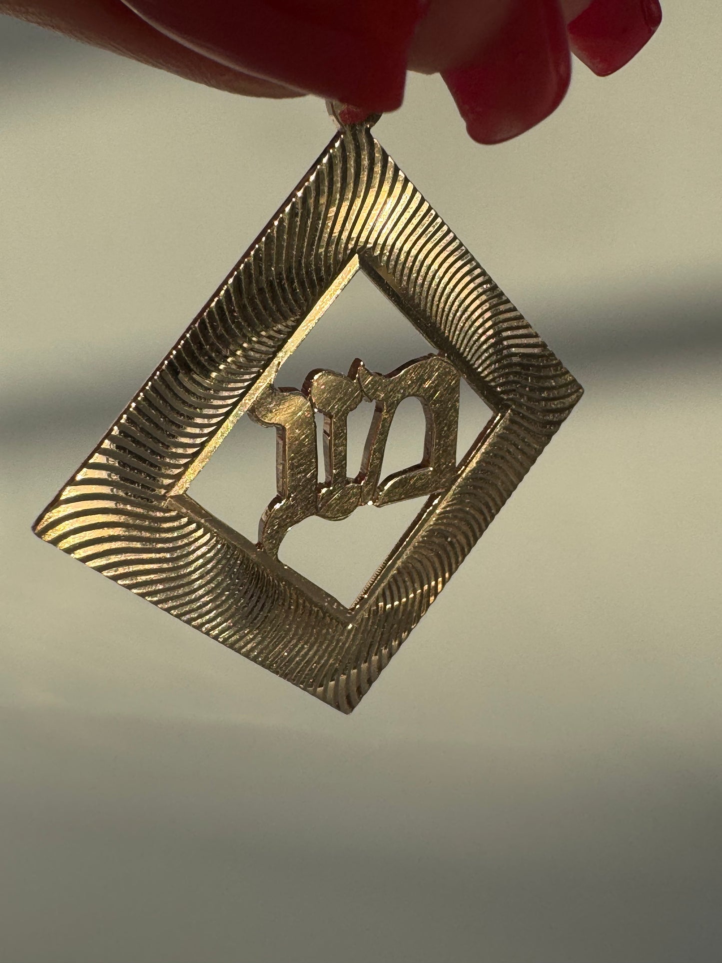 Large “Mazal” Engine Turned Pendant