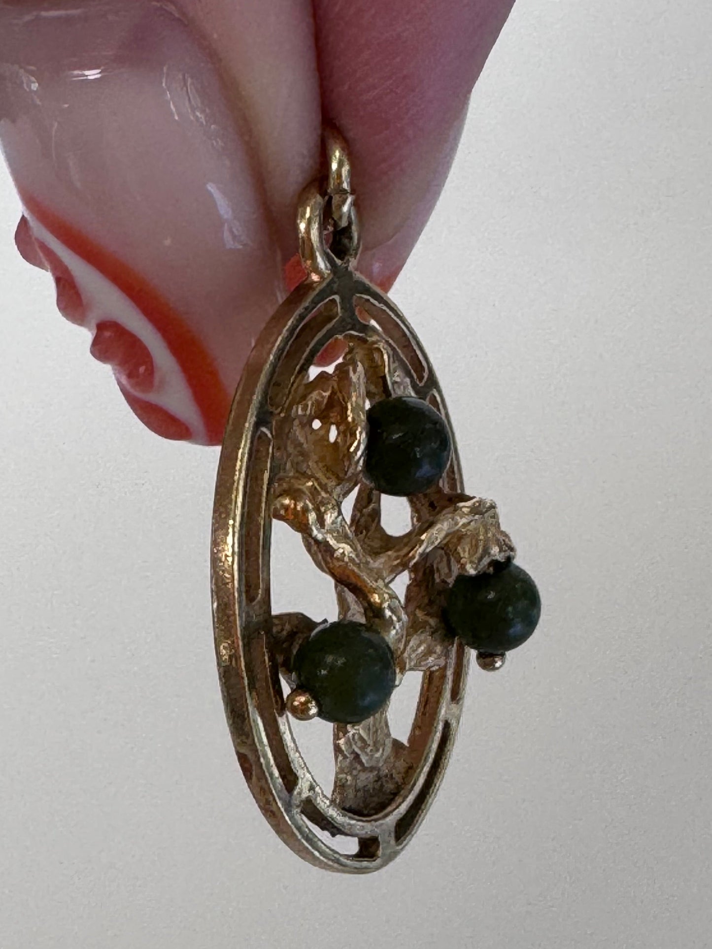 Mid century 14K gold Tree of Life charm pendant with jade accents, pierced branch design, vintage spiritual jewelry