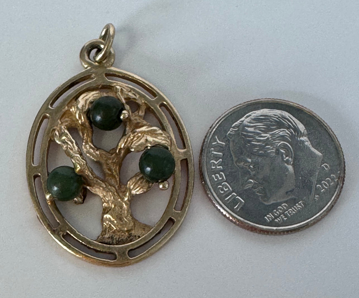 Mid century 14K gold Tree of Life charm pendant with jade accents, pierced branch design, vintage spiritual jewelry