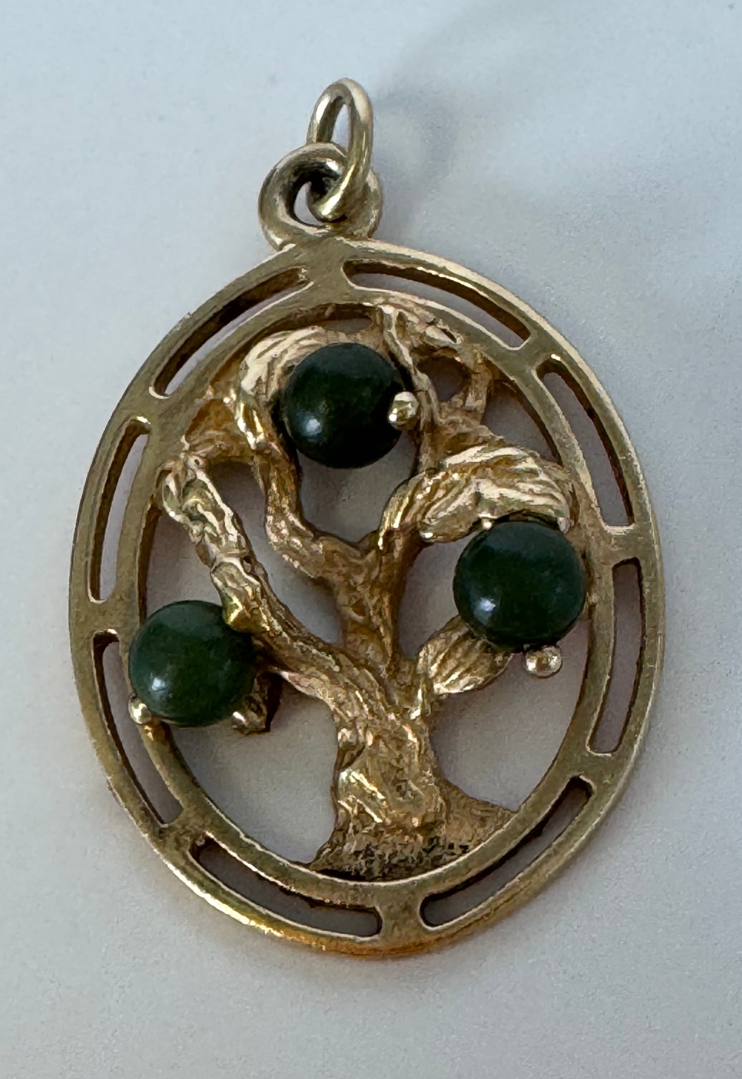 Mid century 14K gold Tree of Life charm pendant with jade accents, pierced branch design, vintage spiritual jewelry