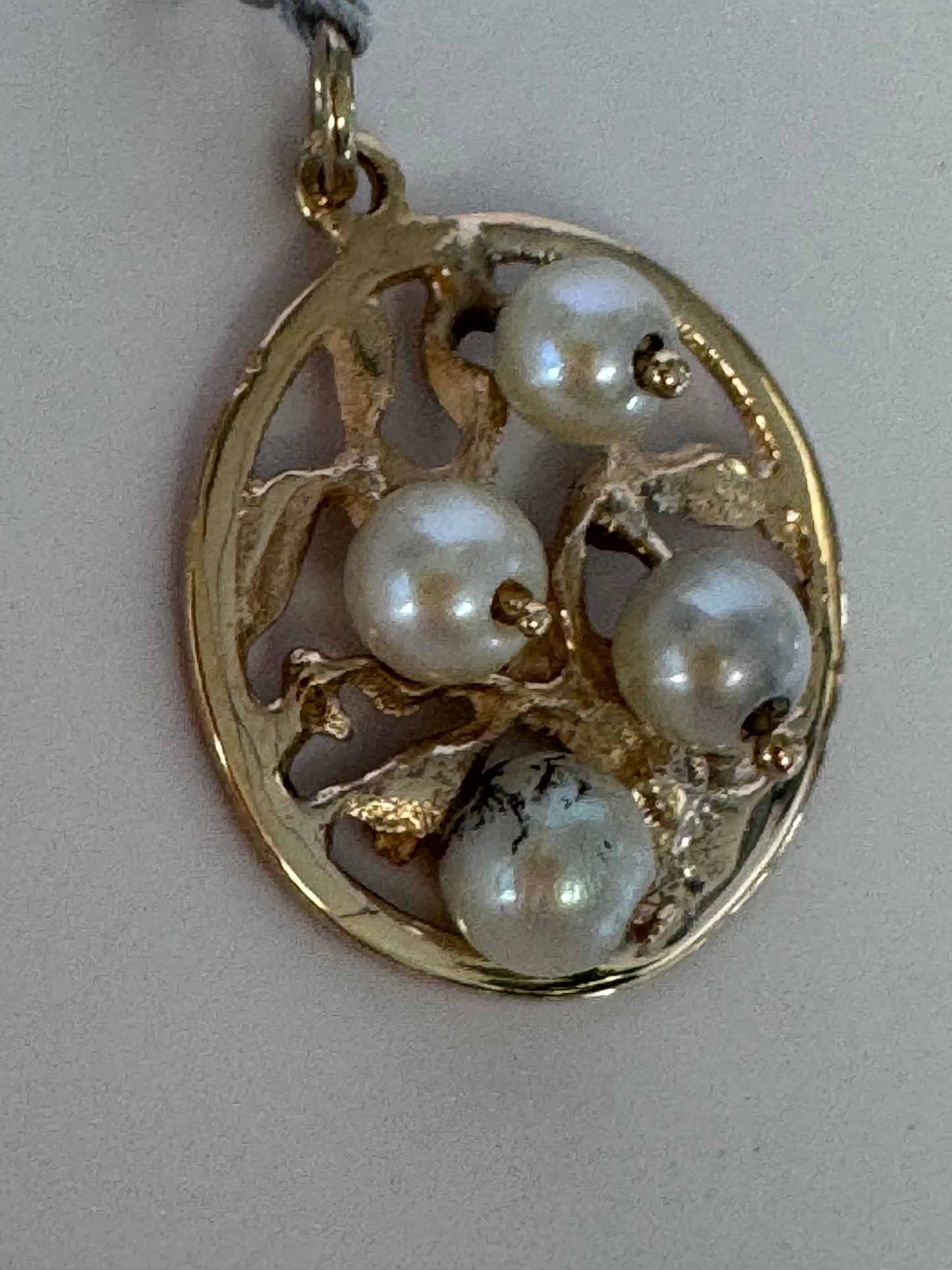 Vintage 14K gold Tree of Life pendant with four pearls set in openwork branches, estate jewelry