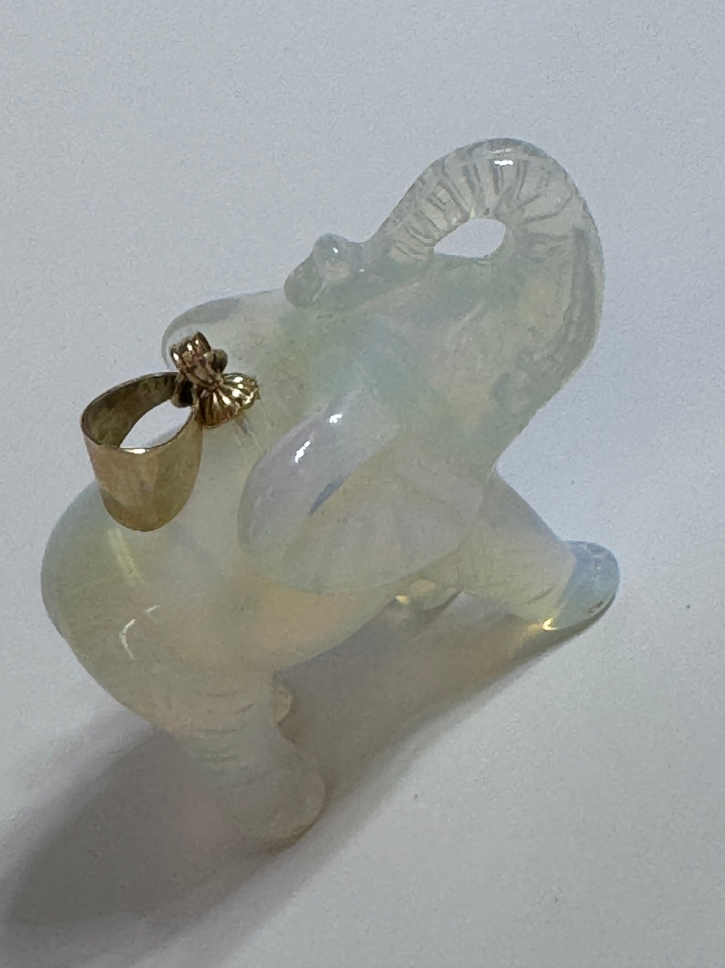 Large hand carved opal elephant pendant with 14K gold bail, trunk up position, estate jewelry good luck charm