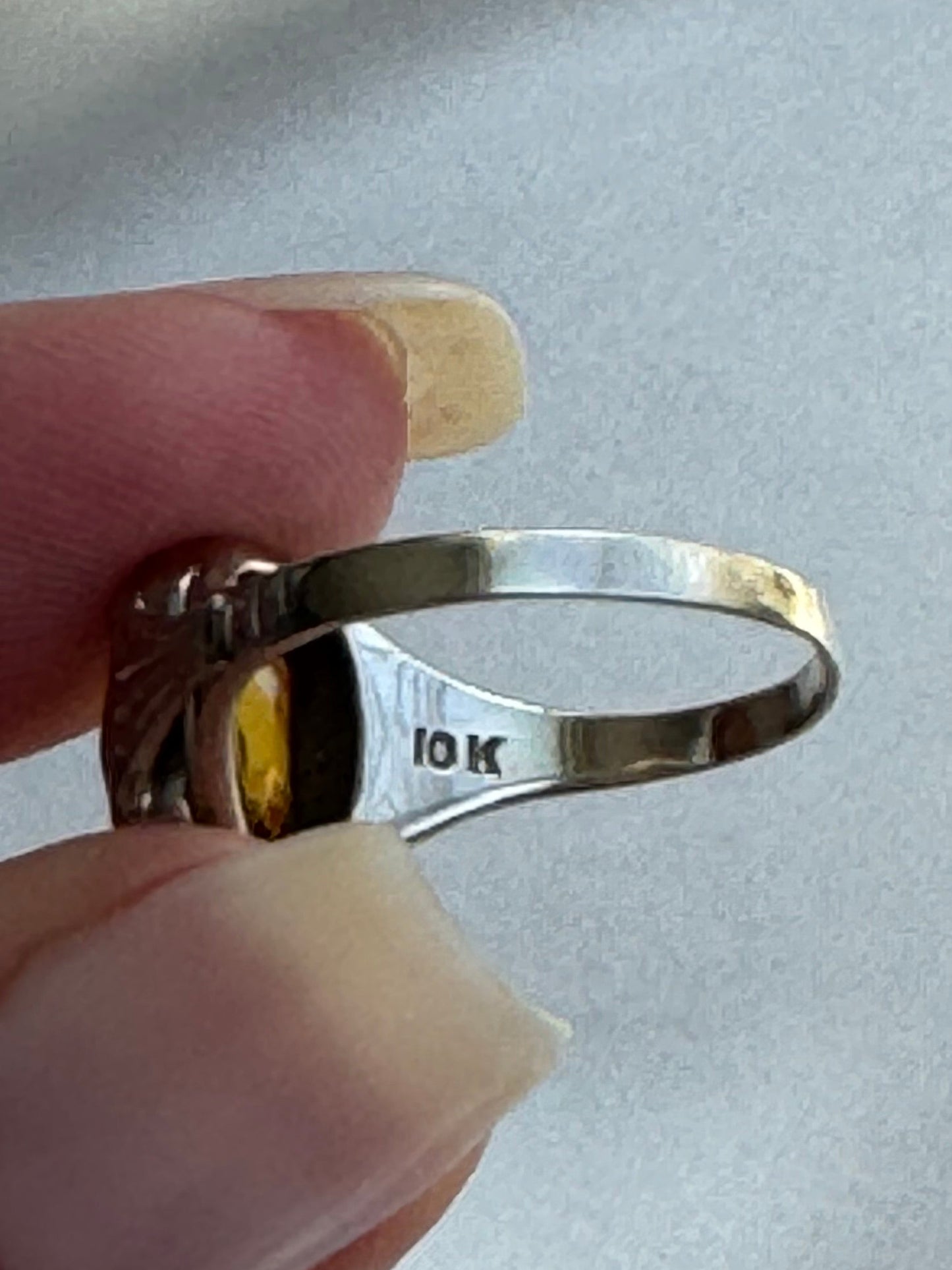 10K white gold ring with octagonal cut citrine stone featuring Art Deco geometric detailing