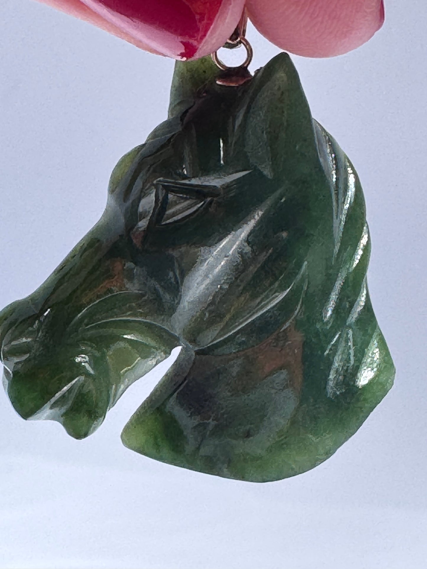 Estate vintage 14K gold pendant featuring hand-carved natural imperial green jadeite horse head with olive undertones, Chinese zodiac equestrian jewelry