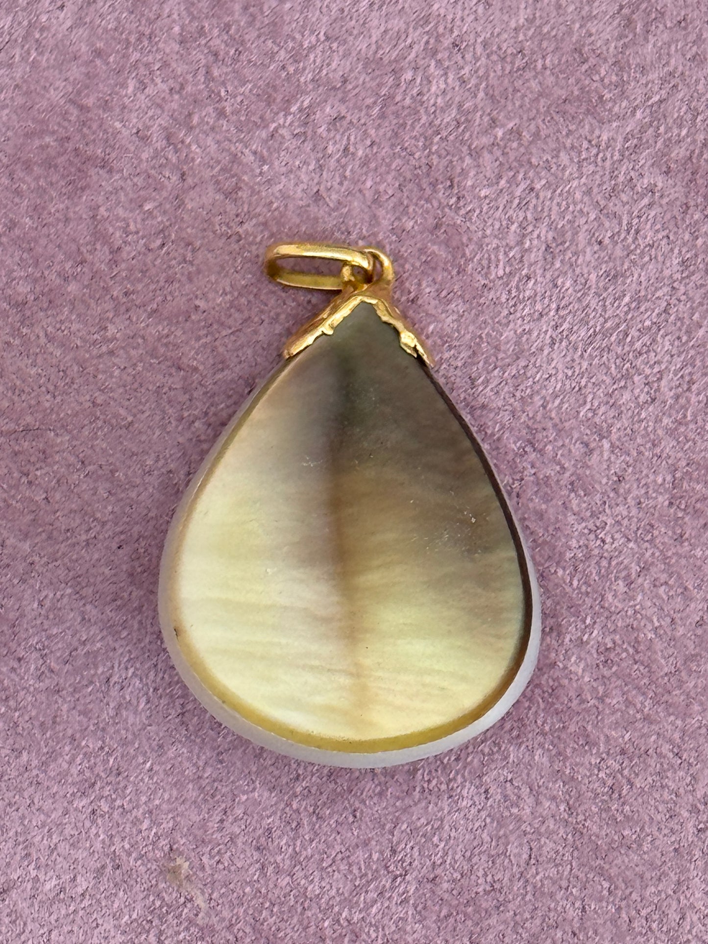 Vintage mother of pearl teardrop pendant with natural golden striping and 14k gold decorative bail, estate jewelry