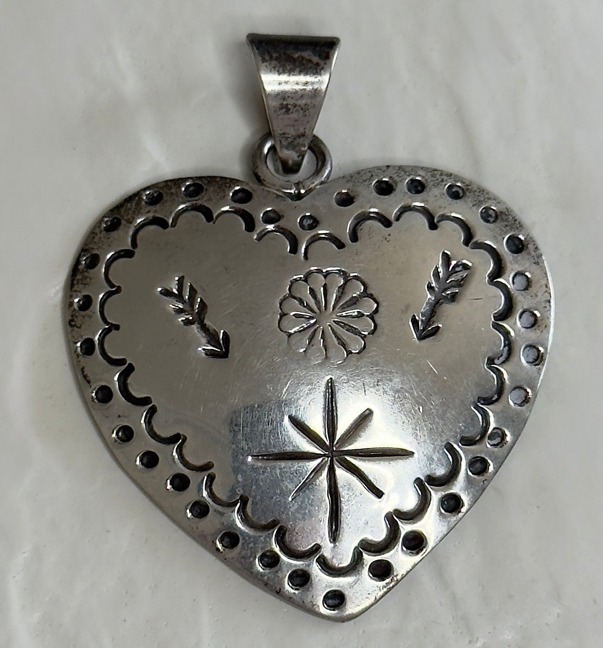 Estate Mexican sterling silver heart jewelry set with triple dangle earrings and matching pendant, hand-stamped folk designs, 925 hallmarks