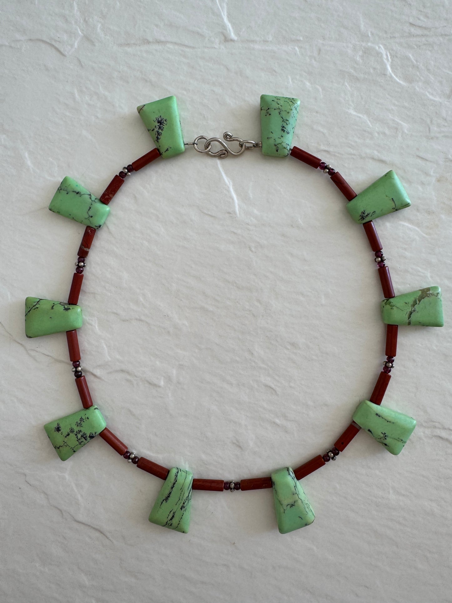 Vintage green aventurine garnet agate sterling silver beaded necklace with black matrix patterns and S-hook clasp from 1970s-80s
Shopify Tags:
vintage aventurine necklace, green aventurine jewelry, garnet necklace, vintage gemstone necklace, sterling silver necklace, 1970s jewelry, 1980s jewelry, bohemian necklace, New Age jewelry, metaphysical jewelry, crystal healing jewelry, vintage boho necklace, estate jewelry, vintage beaded necklace, aventurine garnet necklace, vintage stone necklace, hippie jewelry,