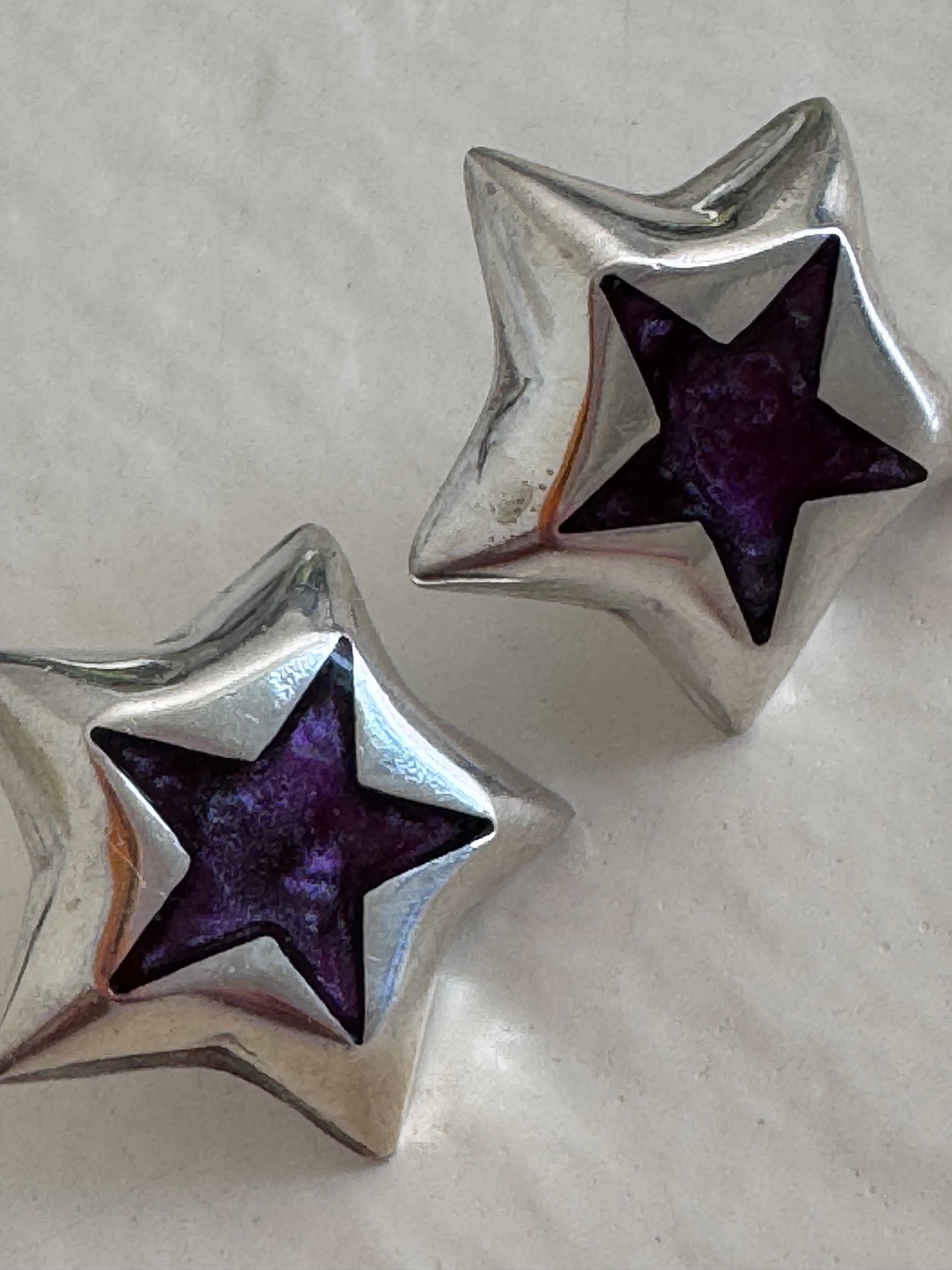 Estate Taxco Mexican sterling silver star earrings with deep purple enamel inlay, showing TD-89 workshop marking and dimensional construction