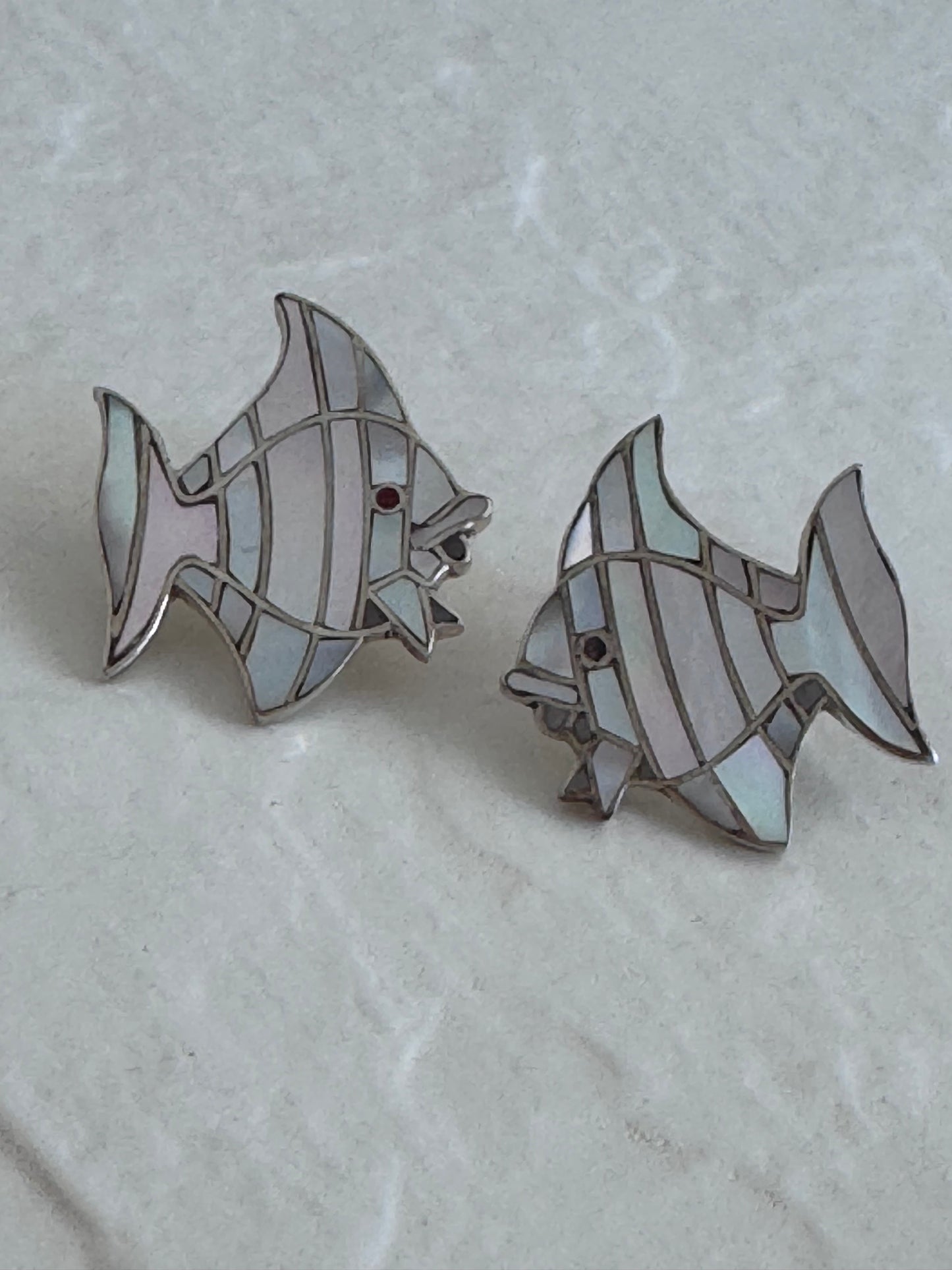 Vintage sterling silver angelfish brooches with mother of pearl mosaic inlay and red accent eyes