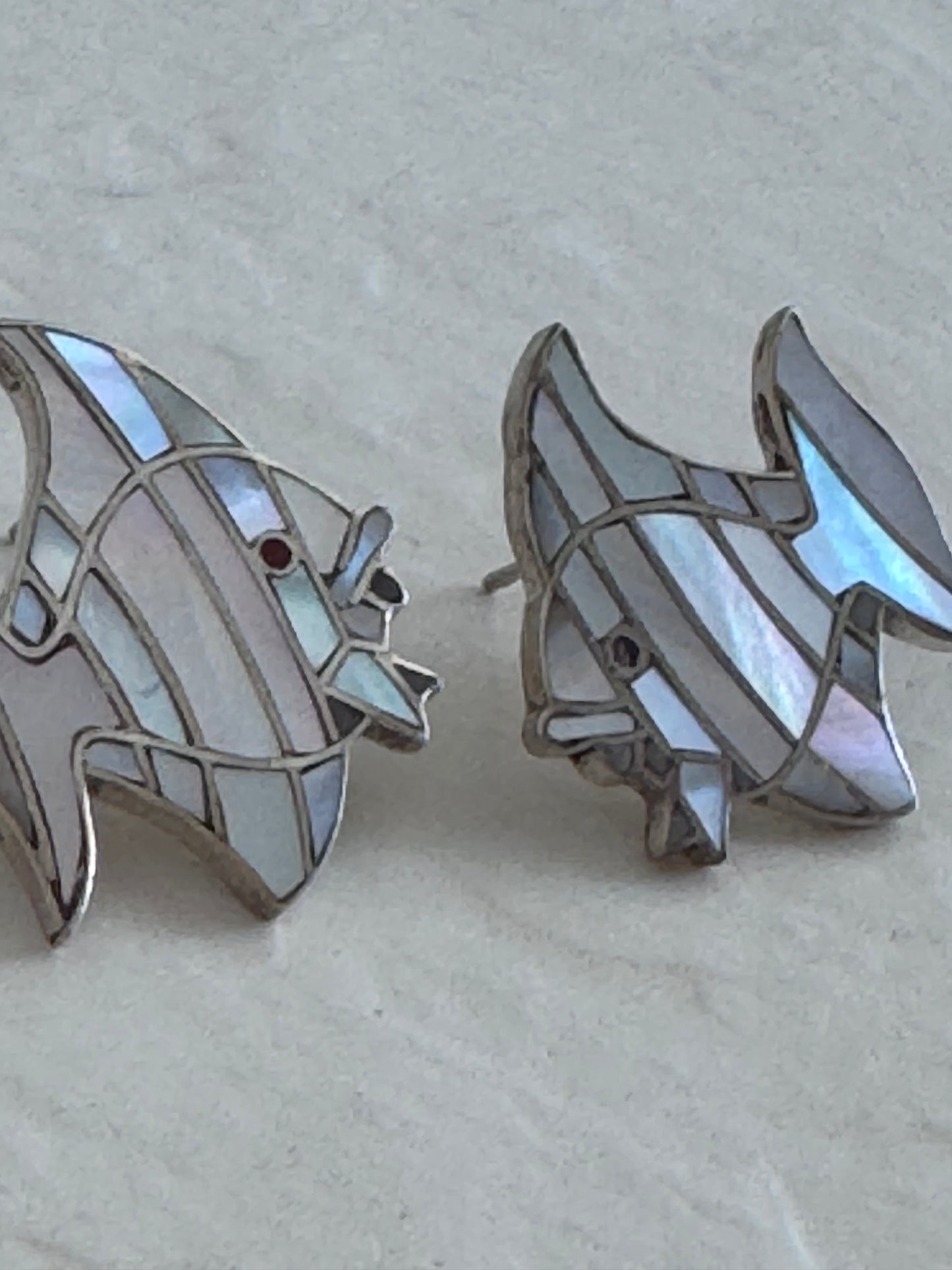 Vintage sterling silver angelfish brooches with mother of pearl mosaic inlay and red accent eyes
