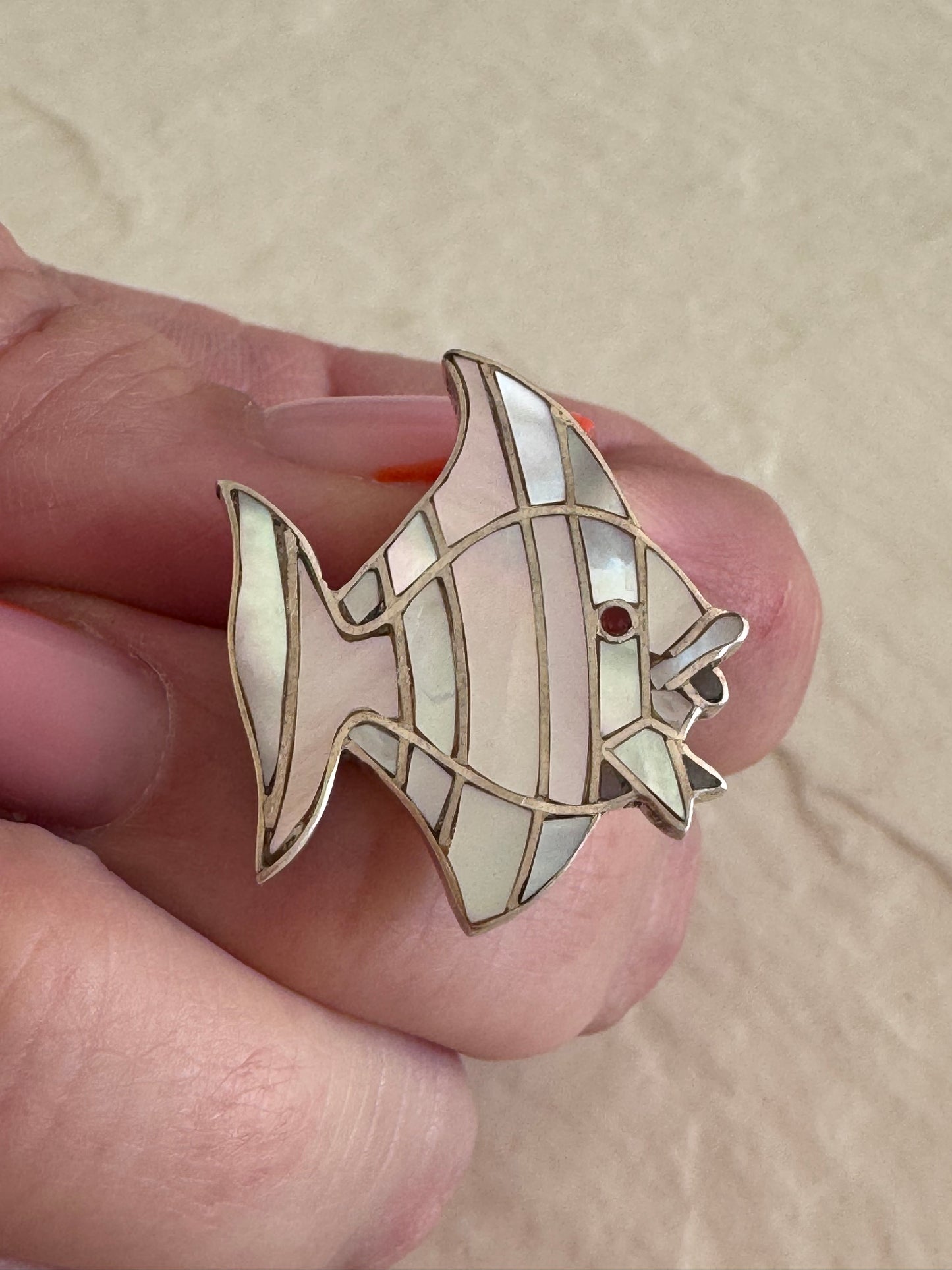 Vintage sterling silver angelfish brooches with mother of pearl mosaic inlay and red accent eyes