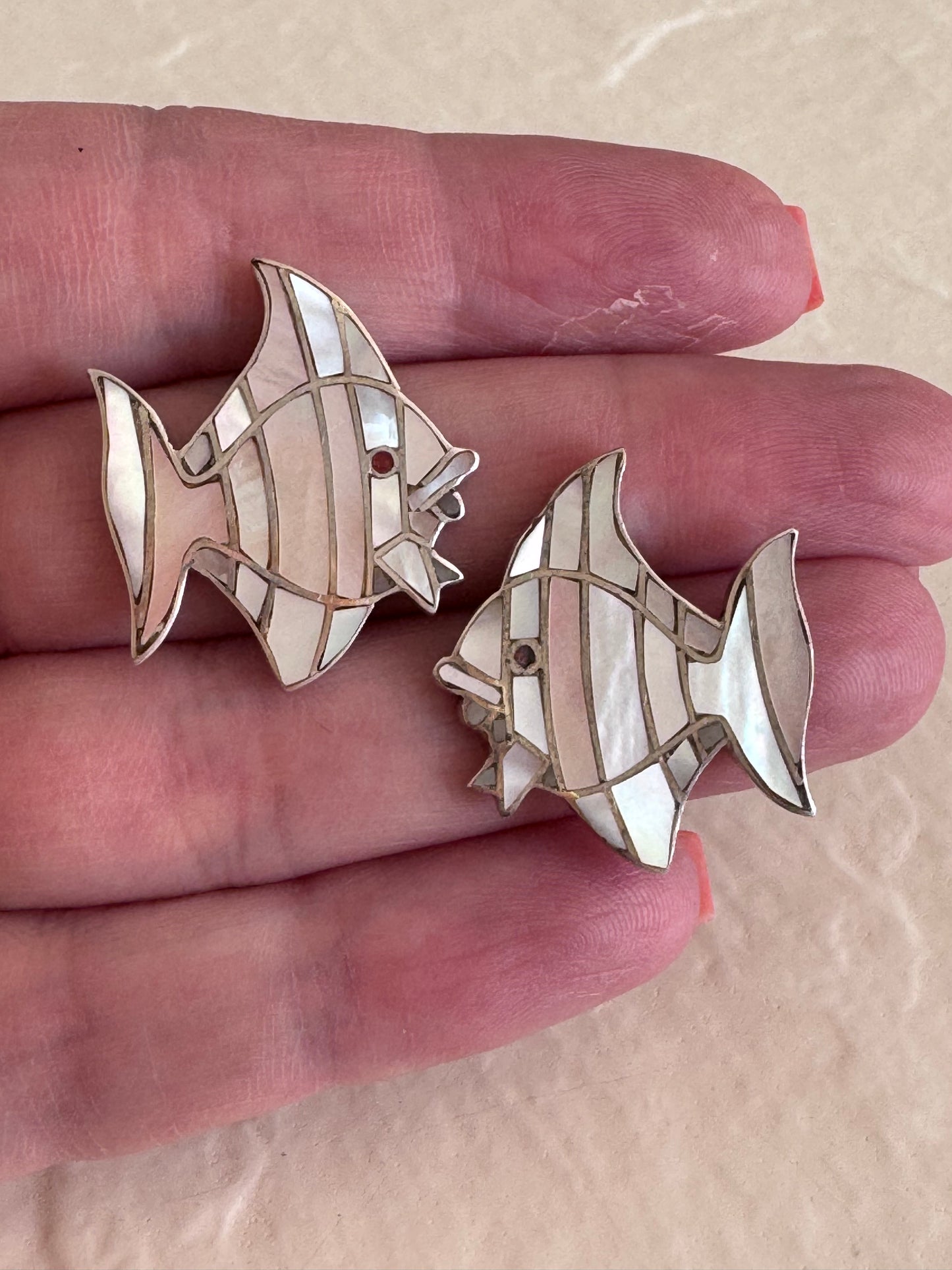 Vintage sterling silver angelfish brooches with mother of pearl mosaic inlay and red accent eyes