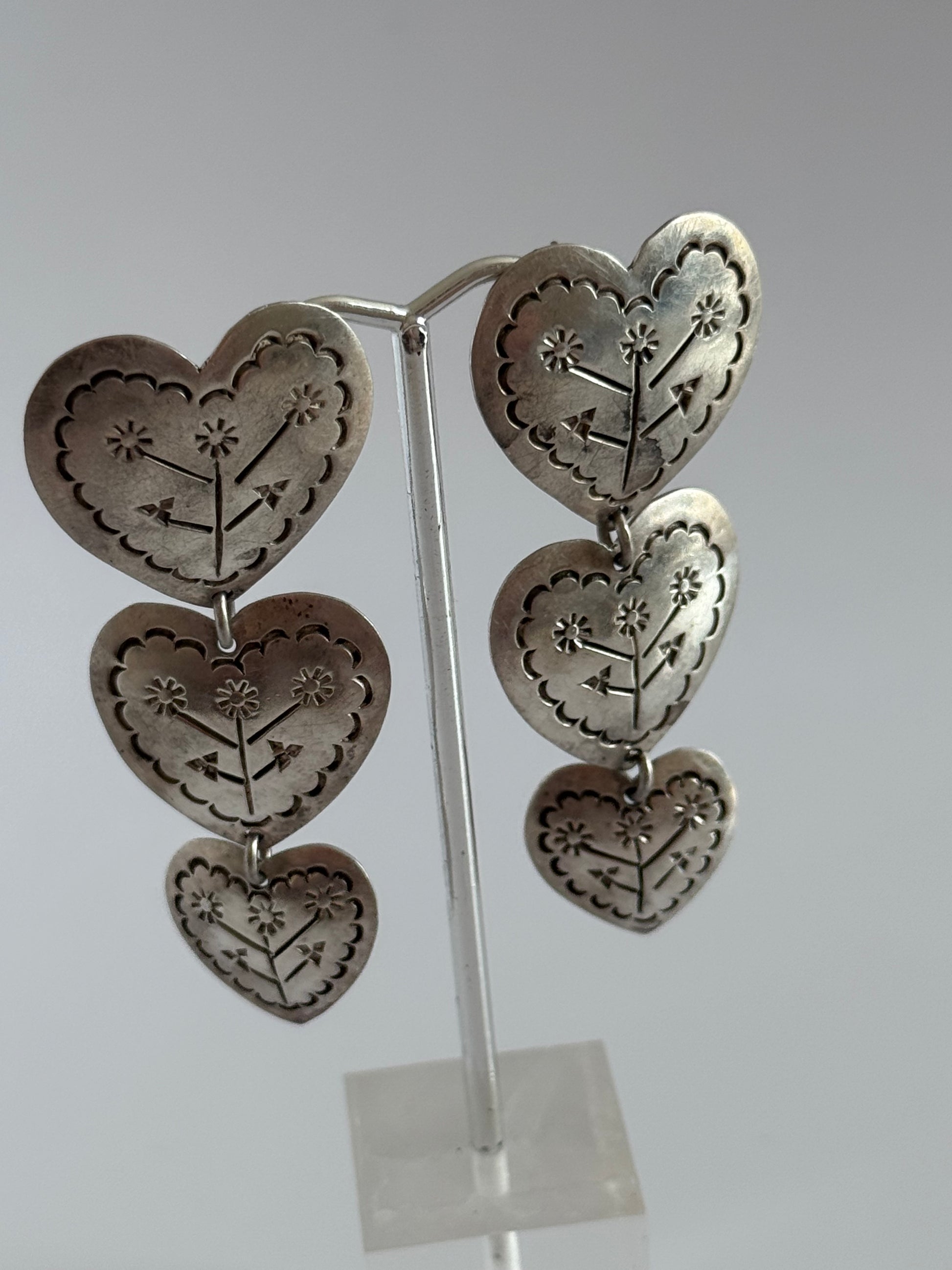 Estate Mexican sterling silver heart jewelry set with triple dangle earrings and matching pendant, hand-stamped folk designs, 925 hallmarks