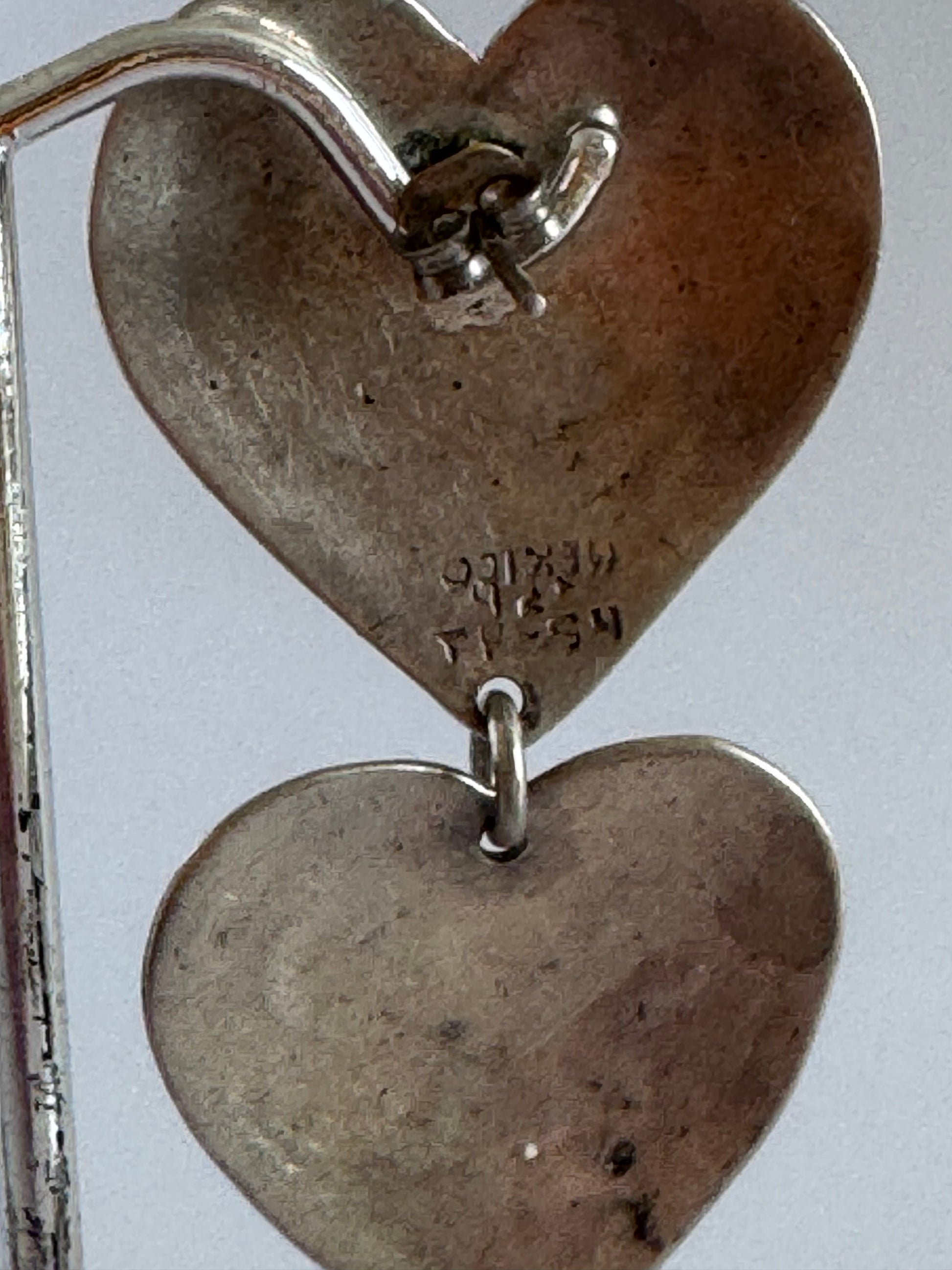 Estate Mexican sterling silver heart jewelry set with triple dangle earrings and matching pendant, hand-stamped folk designs, 925 hallmarks