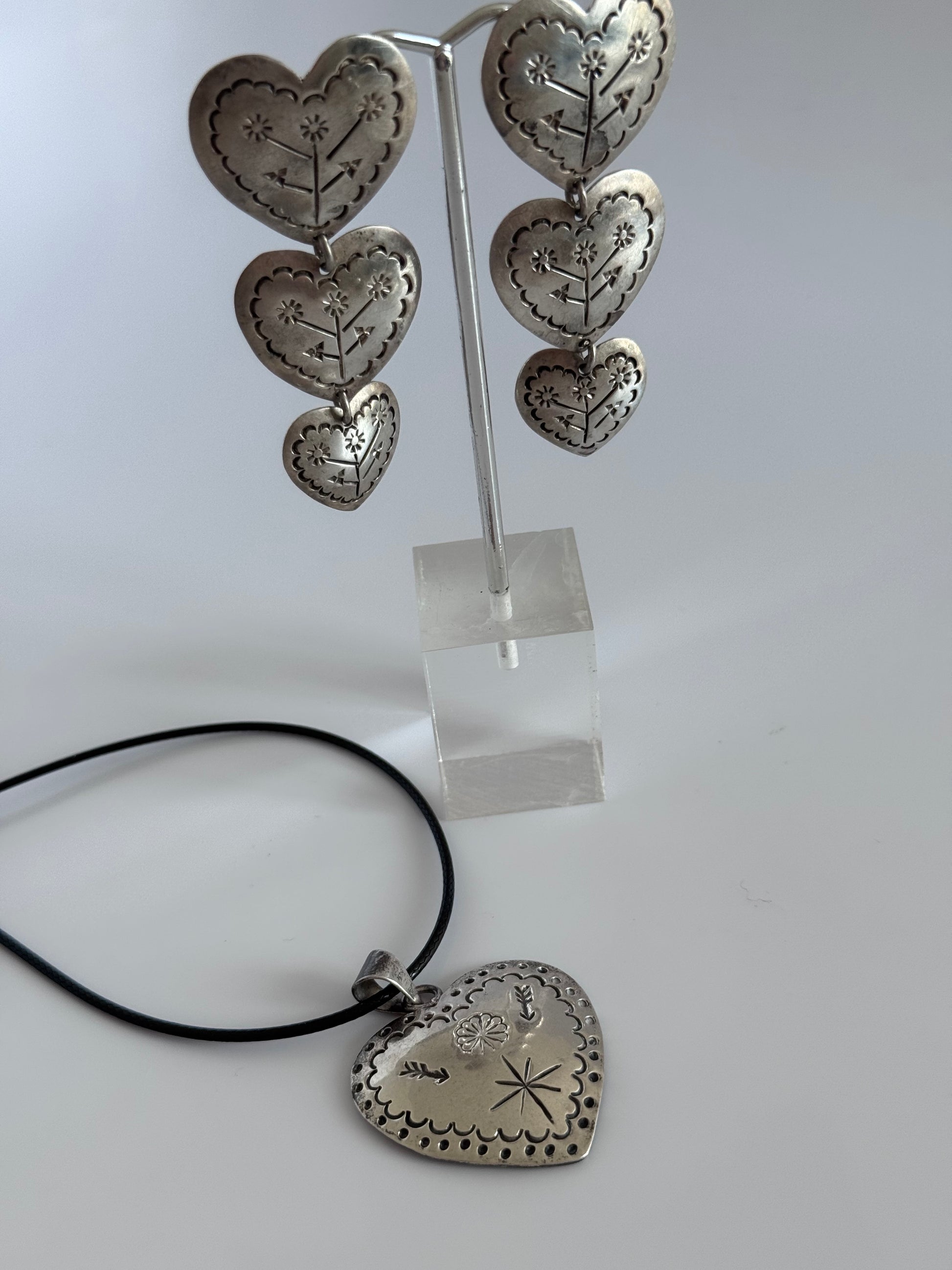 Estate Mexican sterling silver heart jewelry set with triple dangle earrings and matching pendant, hand-stamped folk designs, 925 hallmarks