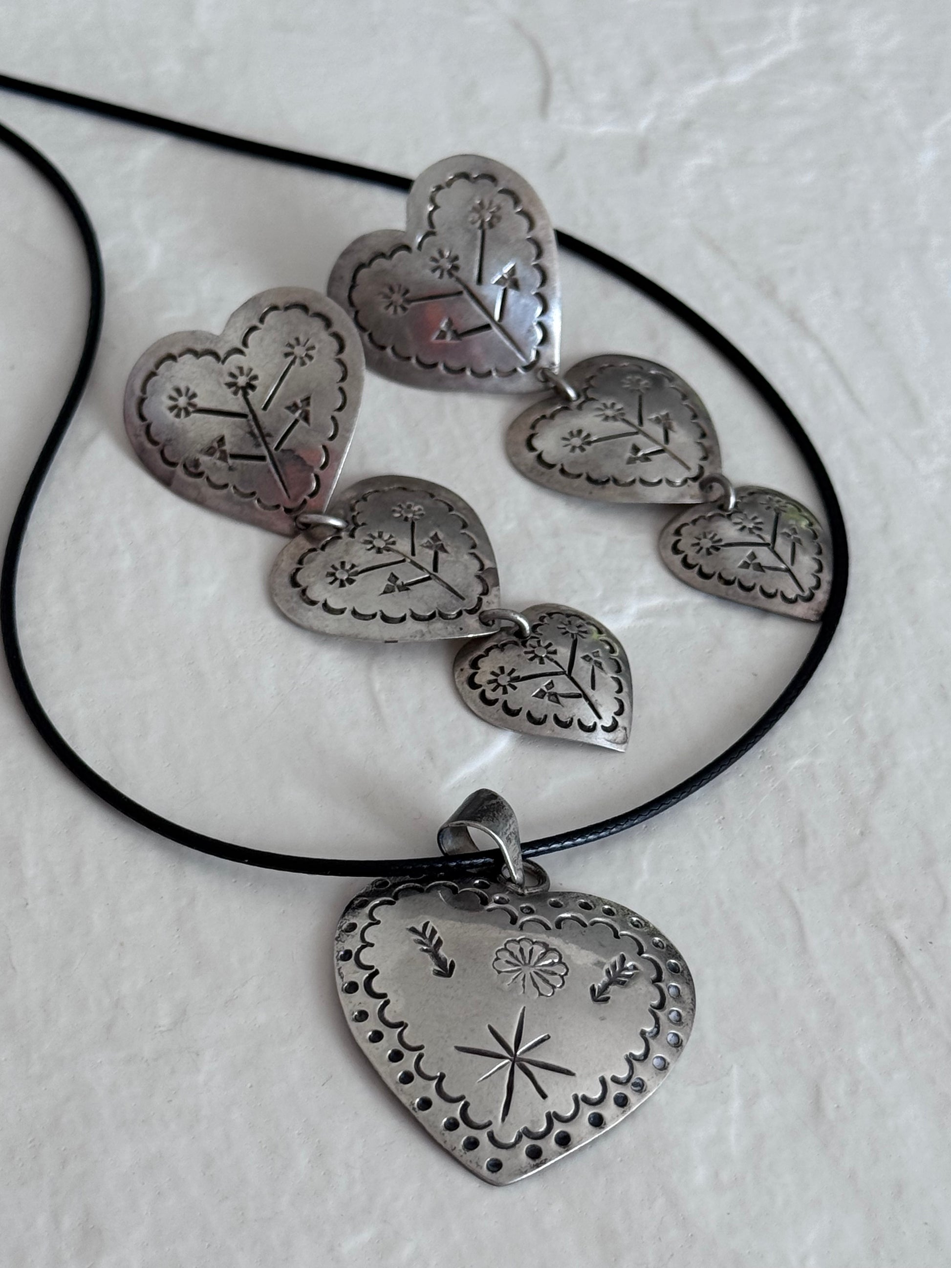 Estate Mexican sterling silver heart jewelry set with triple dangle earrings and matching pendant, hand-stamped folk designs, 925 hallmarks