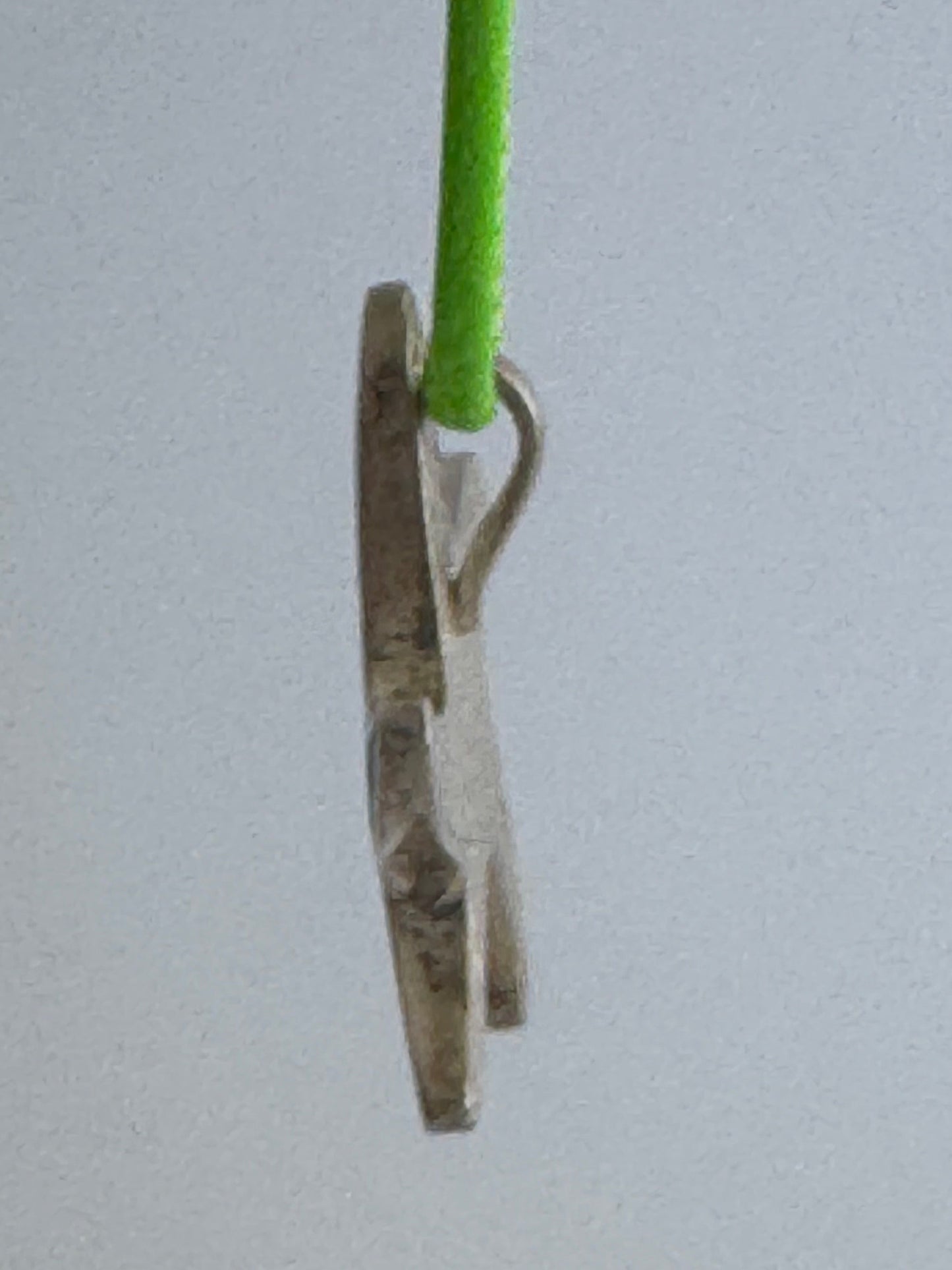 Vintage sterling silver starfish pendant with mother of pearl and green resin mosaic inlay, showing detailed craftsmanship and 925 hallmark
