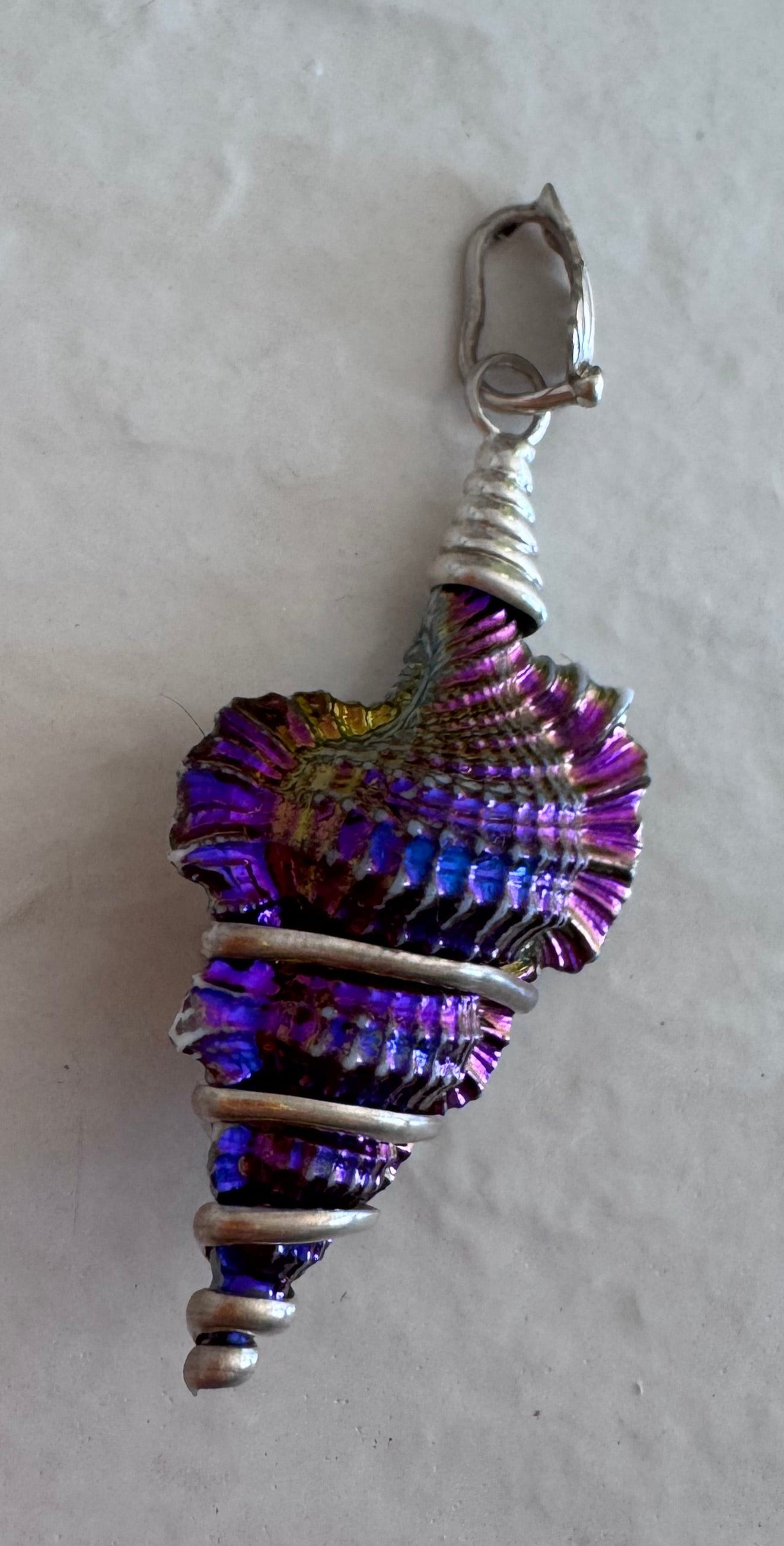Estate sterling silver wire wrapped shell pendants with rainbow chrome iridescent finish showing purple blue and gold colors, approximately 2 inches long