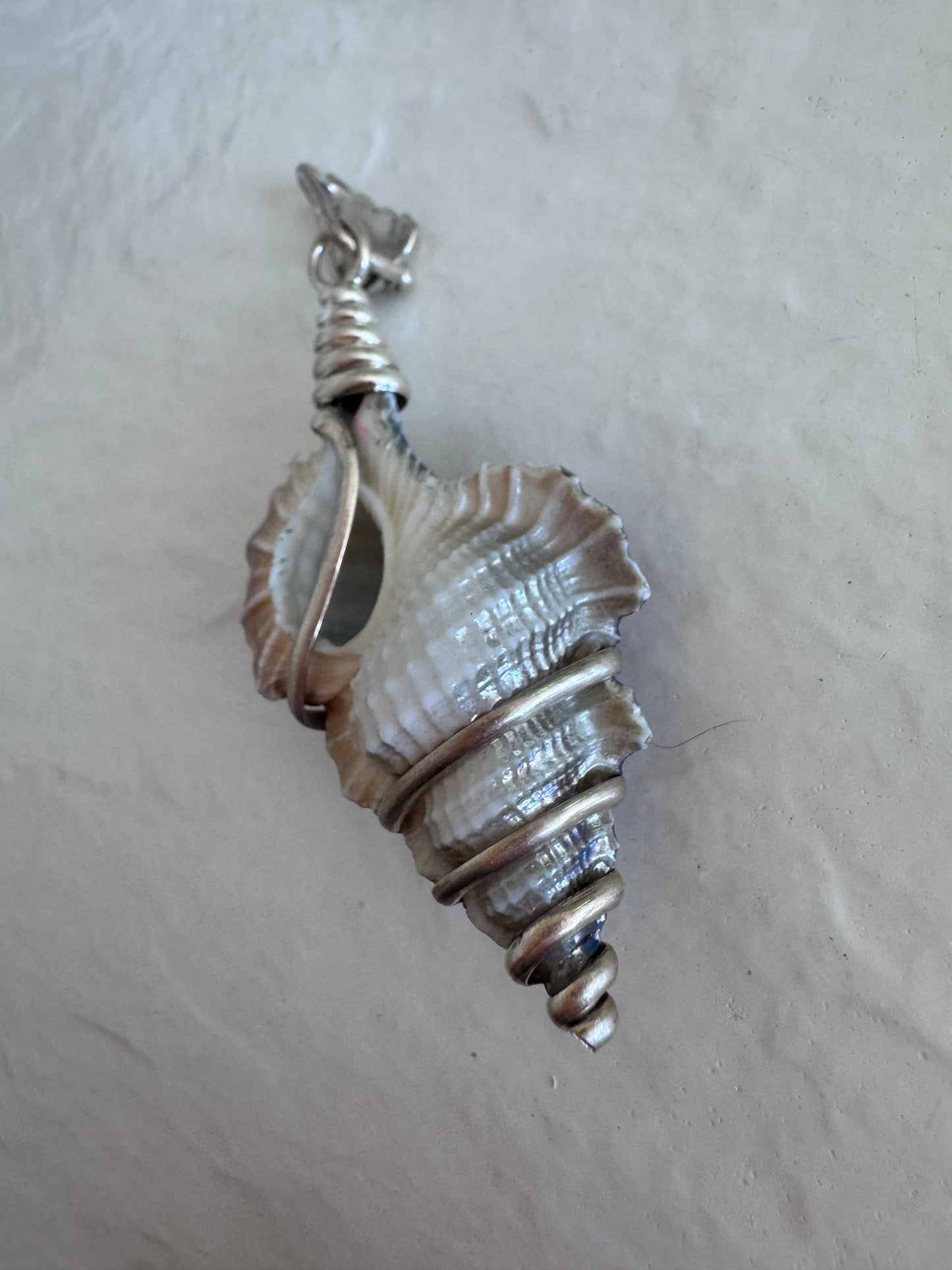 Estate sterling silver wire wrapped shell pendants with rainbow chrome iridescent finish showing purple blue and gold colors, approximately 2 inches long