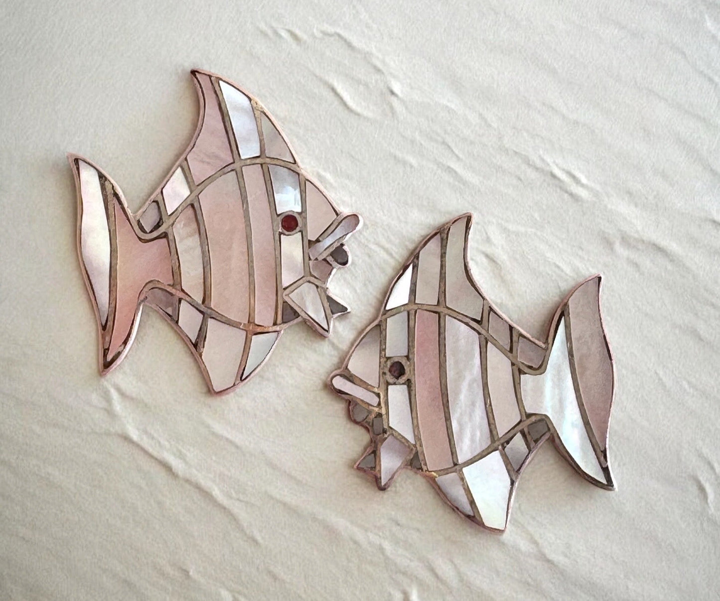 Vintage sterling silver angelfish brooches with mother of pearl mosaic inlay and red accent eyes