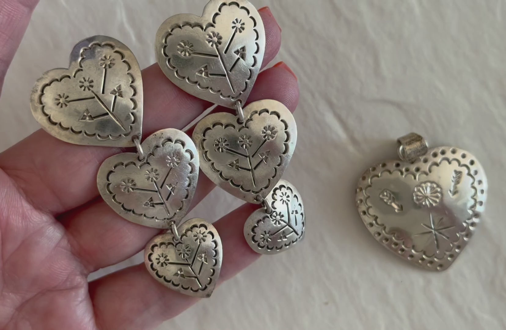 Estate Mexican sterling silver heart jewelry set with triple dangle earrings and matching pendant, hand-stamped folk designs, 925 hallmarks