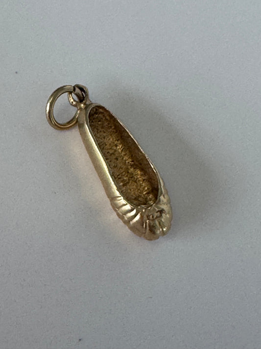 1950s vintage 14K gold ballet slipper charm with textured details, dimensional dance shoe design