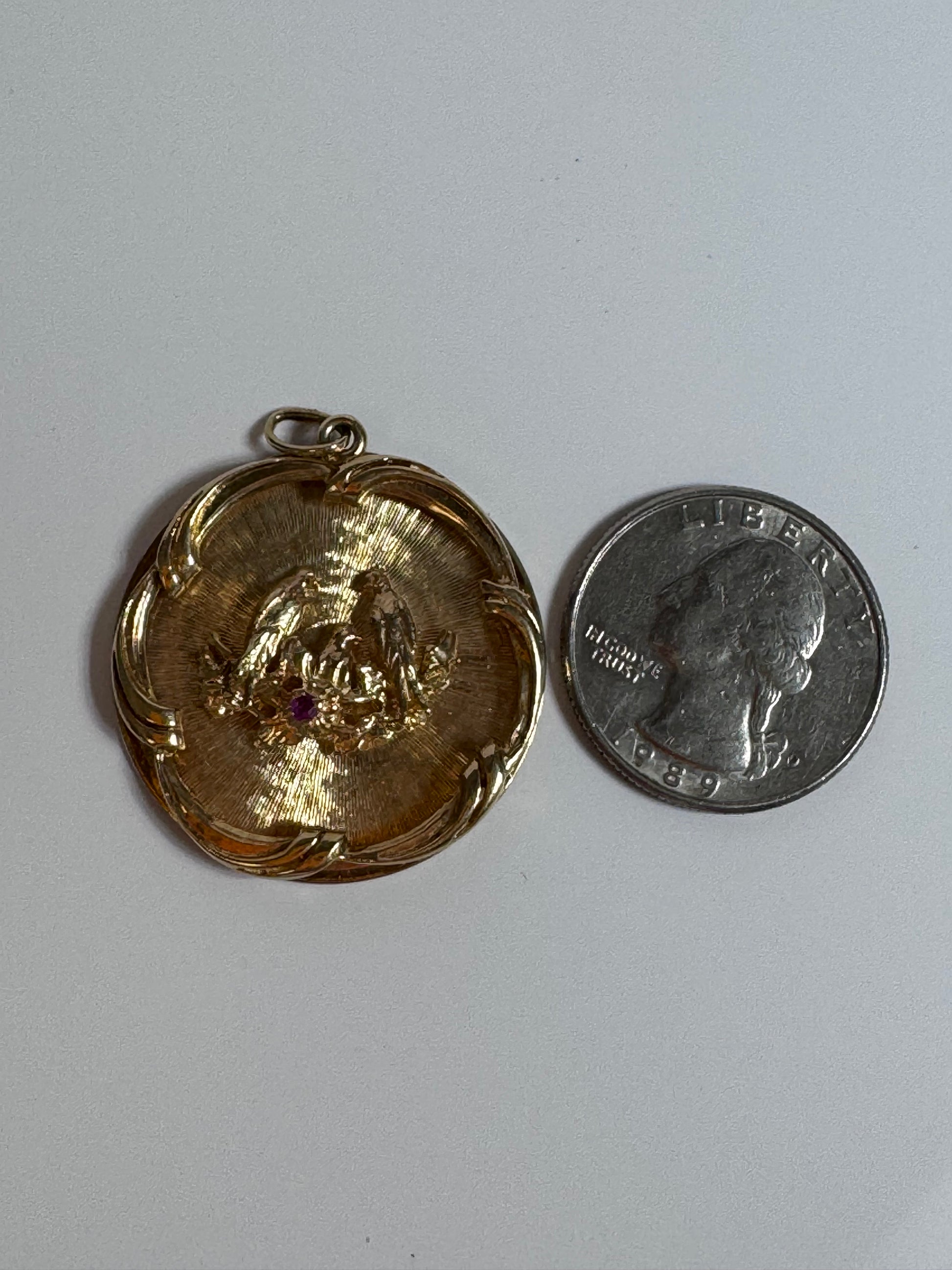1950s 14K gold love birds medallion pendant with engine turned background and ruby accent, vintage romantic jewelry