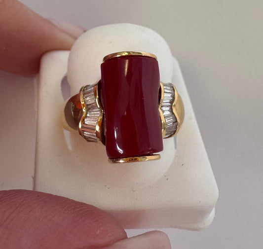 Estate 18K gold ring featuring natural deep red coral centerpiece with diamond baguettes, cocktail ring size 8
