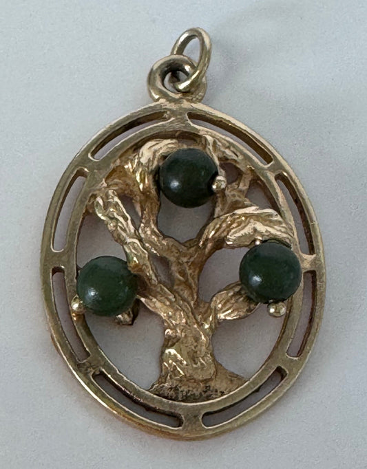 Mid century 14K gold Tree of Life charm pendant with jade accents, pierced branch design, vintage spiritual jewelry