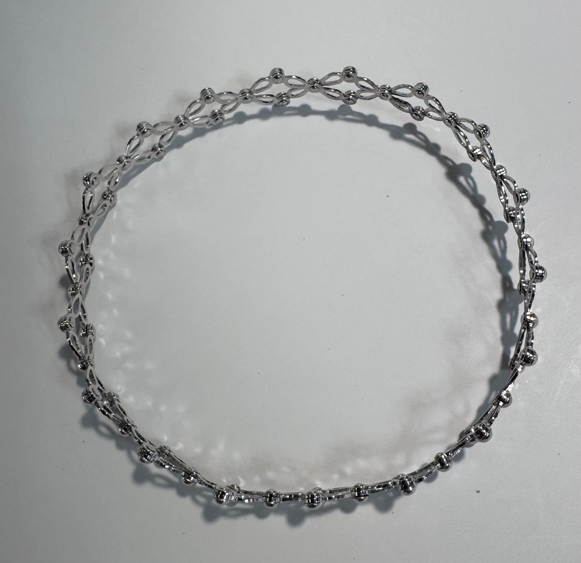 Estate 14K white gold convertible ring bracelet with expandable spherical link mechanism transforming from ring to full bracelet size