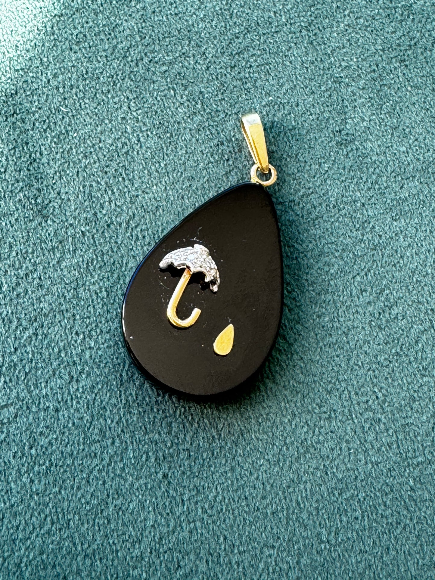 Estate 14K gold black onyx teardrop pendant with inlaid umbrella and raindrop design, diamond accent, 1980s whimsical jewelry