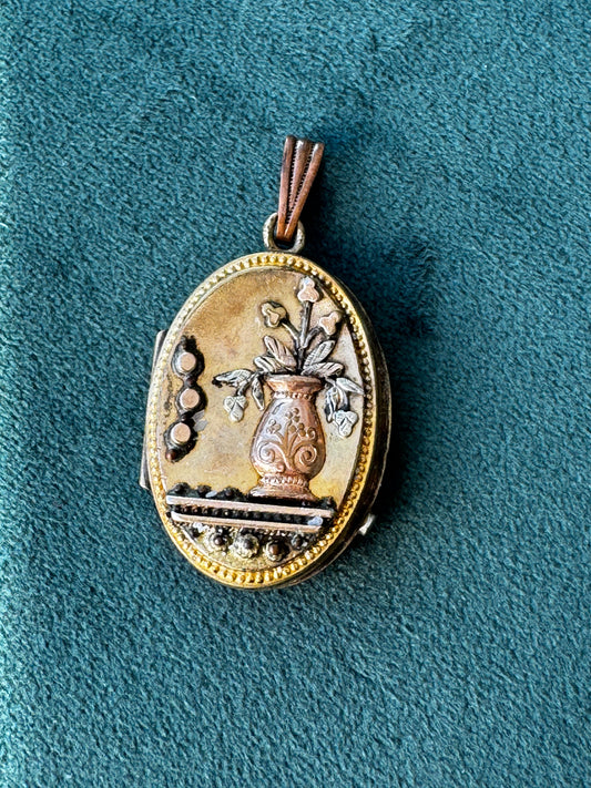 Antique Victorian rolled gold locket with engraved flower vase, multicolored gold, oval shape
