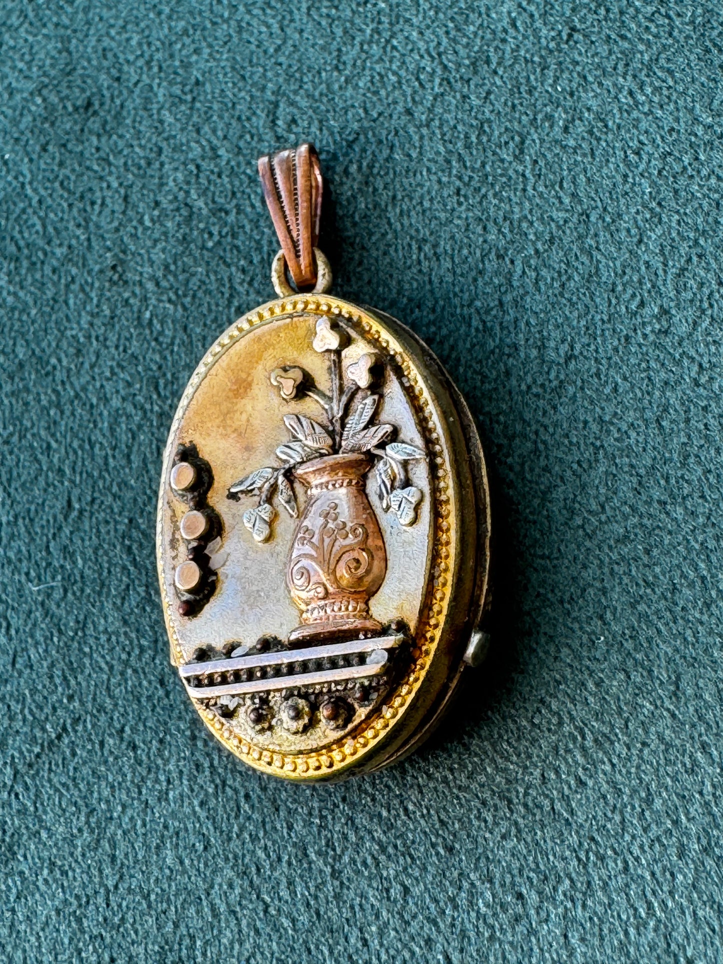 Antique Victorian rolled gold locket with engraved flower vase, multicolored gold, oval shape