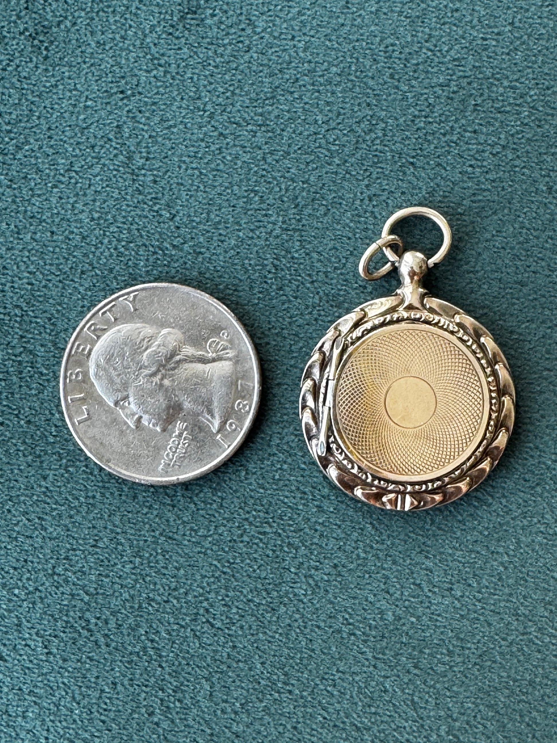 Antique 14K gold round locket with engine turned  pattern and ornate border, original Victorian photo inside