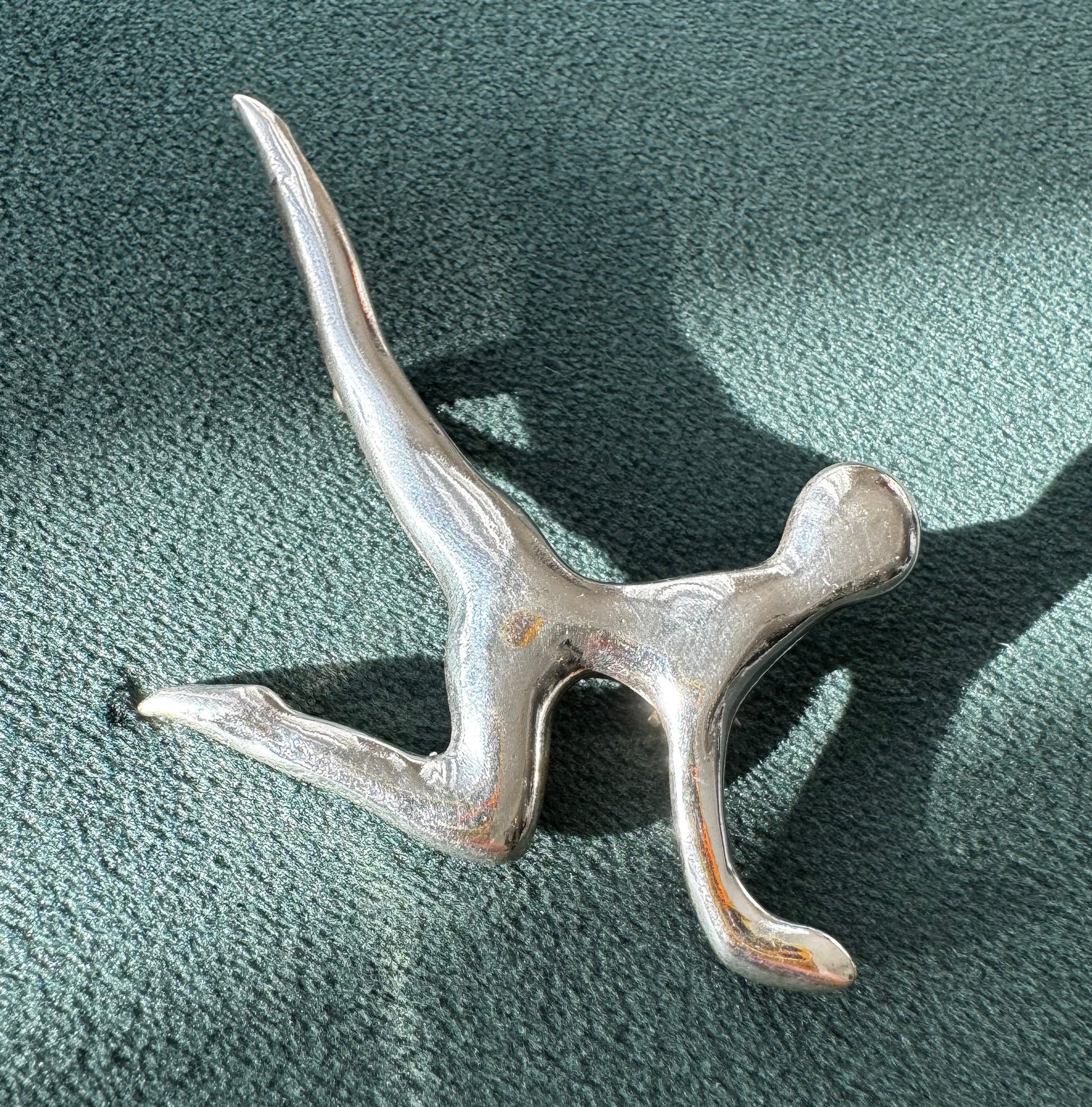Estate vintage Taxco Mexico TE-78 sterling silver modernist abstract dancer brooch, sculptural human figure with elongated limbs in dynamic leaping pose, 1.5 inches, 11.7 grams
