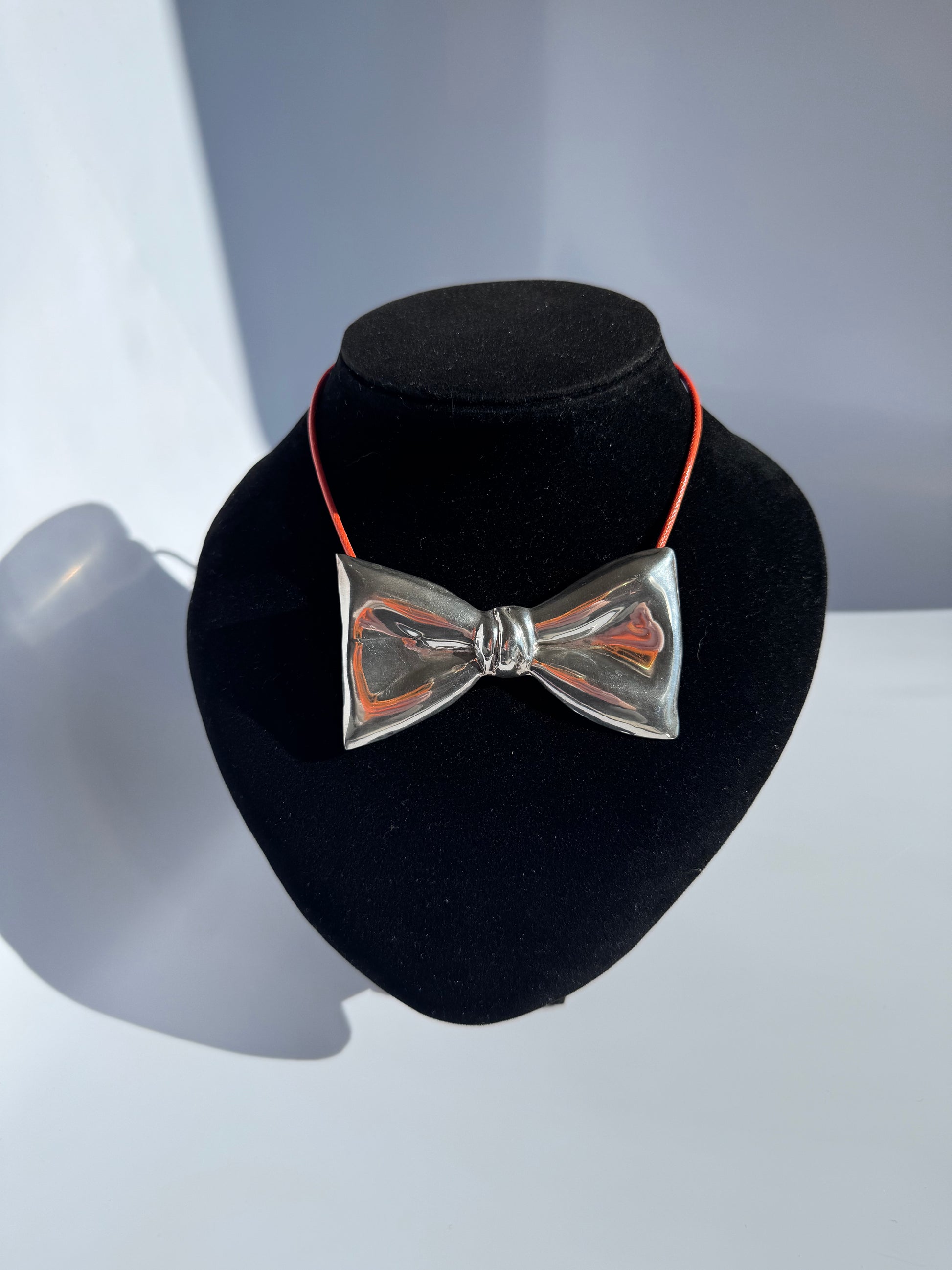 Estate vintage Taxco Mexico TH-24 sterling silver modernist bow pendant brooch with mirror polish finish and dimensional sculptural design