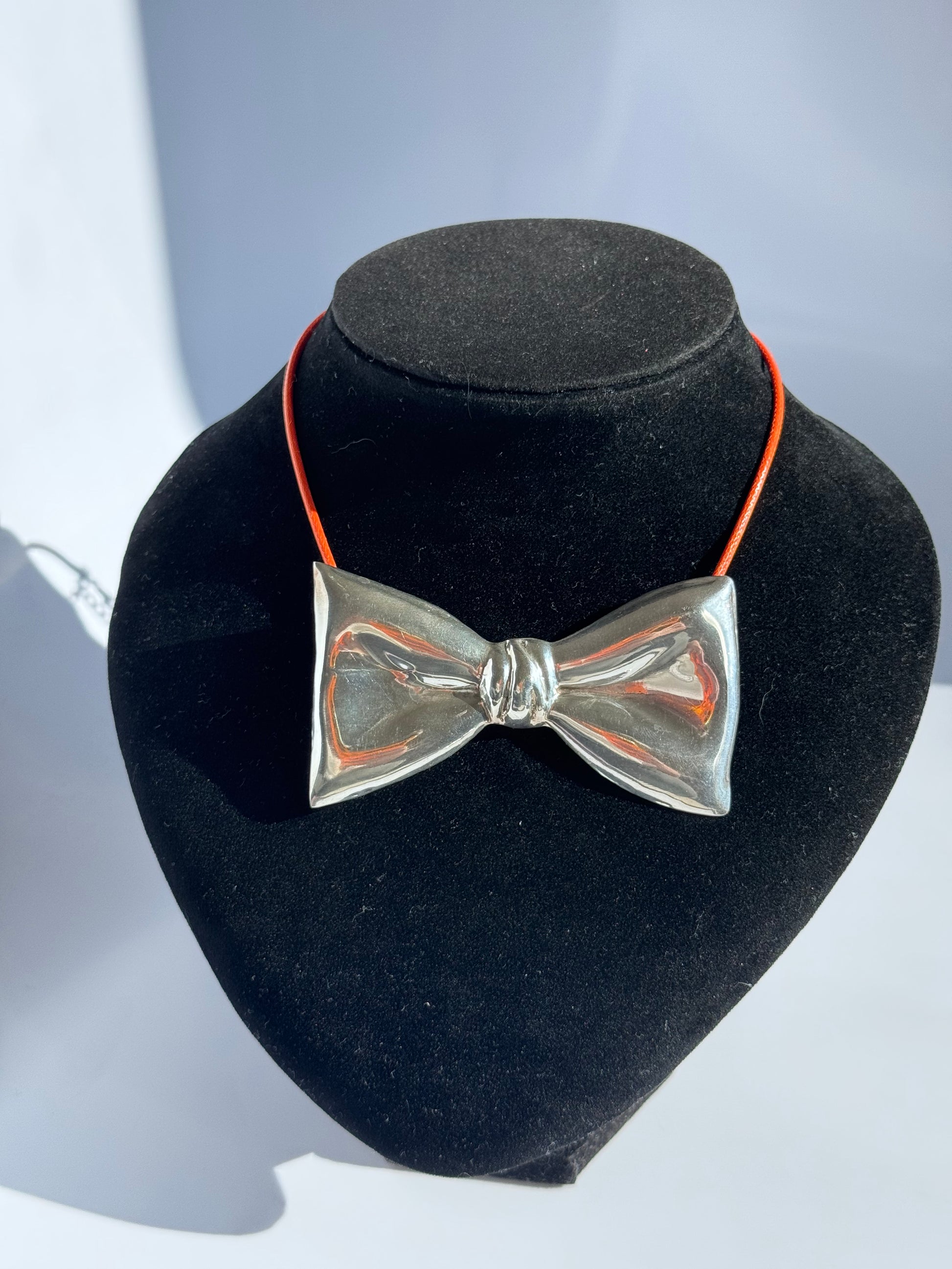Estate vintage Taxco Mexico TH-24 sterling silver modernist bow pendant brooch with mirror polish finish and dimensional sculptural design