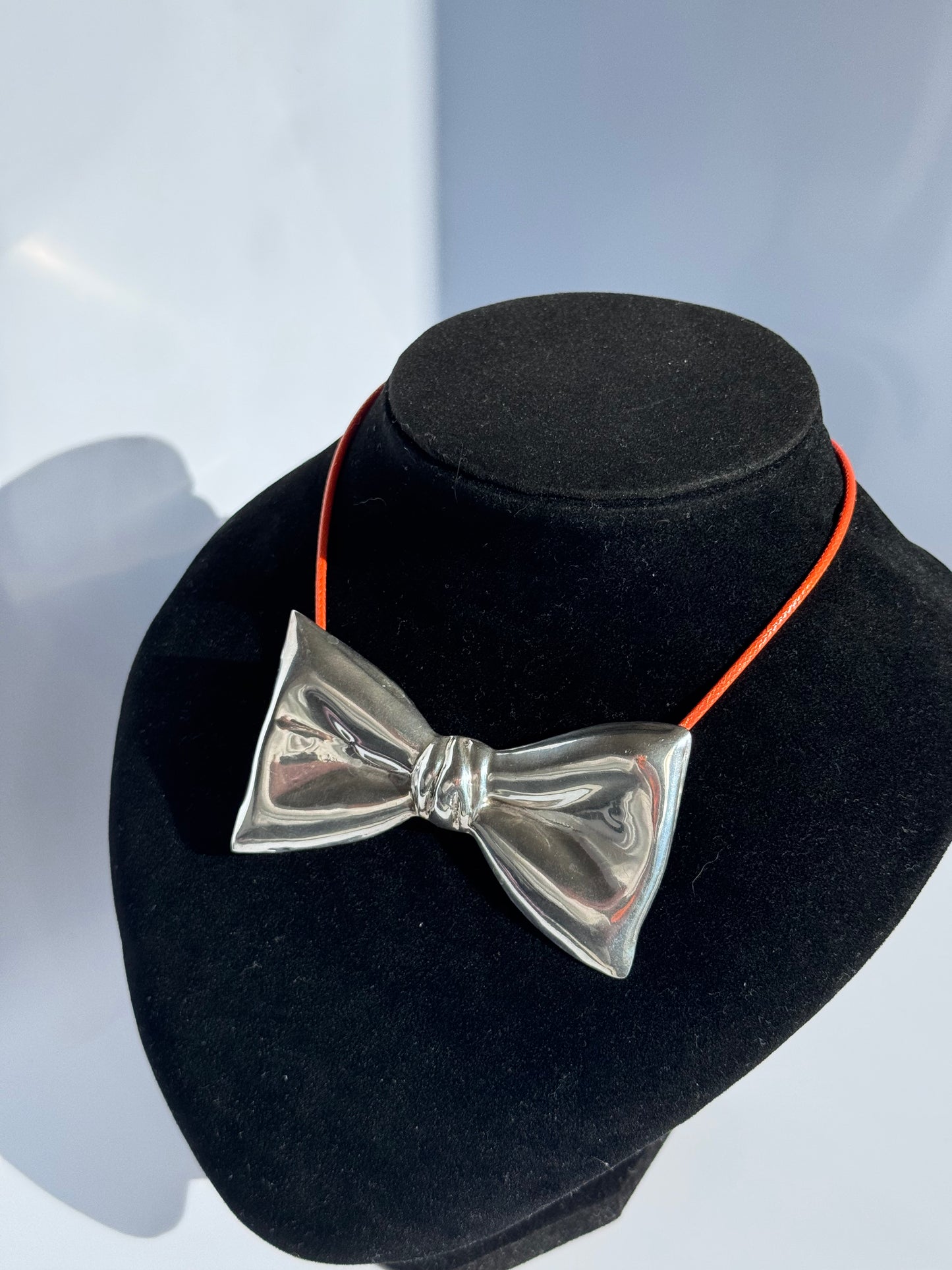 Estate vintage Taxco Mexico TH-24 sterling silver modernist bow pendant brooch with mirror polish finish and dimensional sculptural design