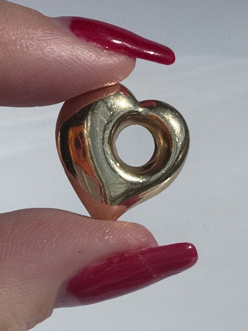 Estate vintage 1980s-1990s 14K yellow gold puffy heart pendant with three-dimensional design and polished finish
