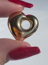 Estate vintage 1980s-1990s 14K yellow gold puffy heart pendant with three-dimensional design and polished finish