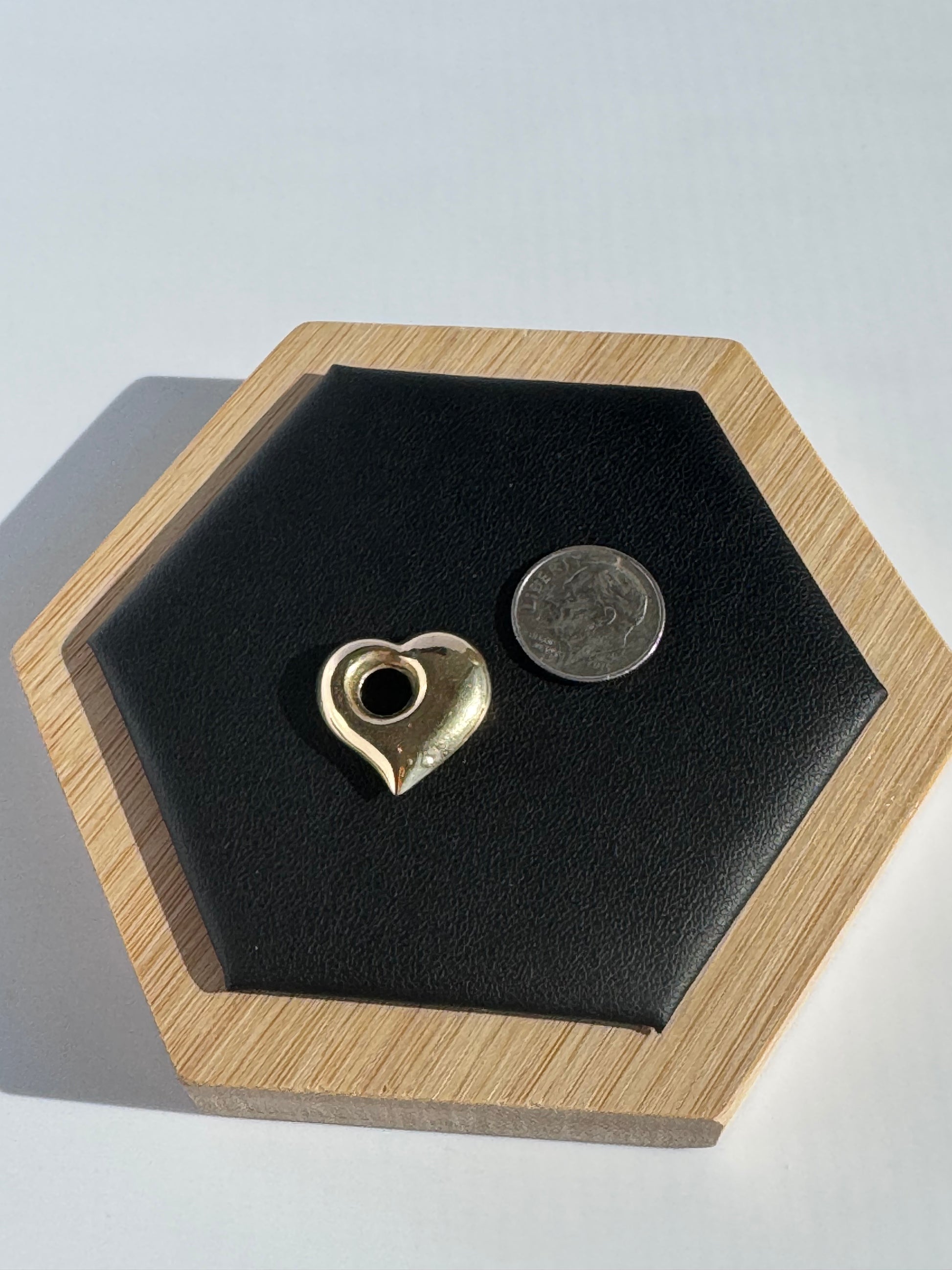 Estate vintage 1980s-1990s 14K yellow gold puffy heart pendant with three-dimensional design and polished finish