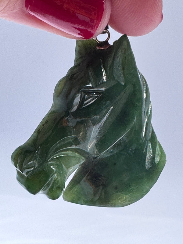Estate vintage 14K gold pendant featuring hand-carved natural imperial green jadeite horse head with olive undertones, Chinese zodiac equestrian jewelry