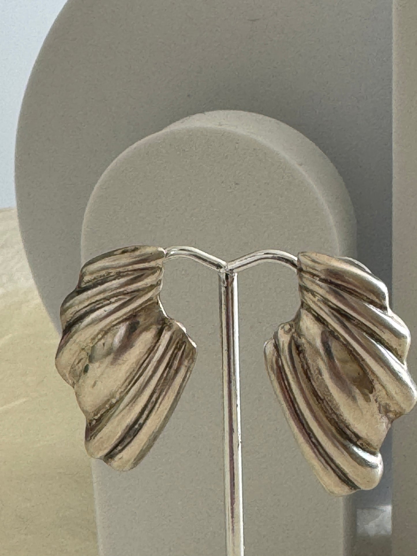 Vintage Mexican sterling silver wing post earrings with ribbed feather texture and Mexico 925 hallmarks